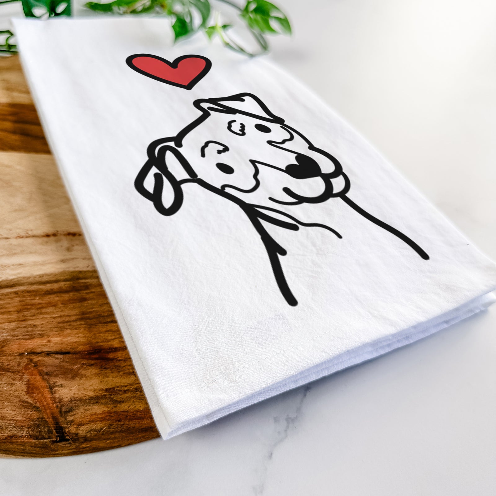 Minimalist line drawing of a Mini Pinscher with a red heart on a tea towel