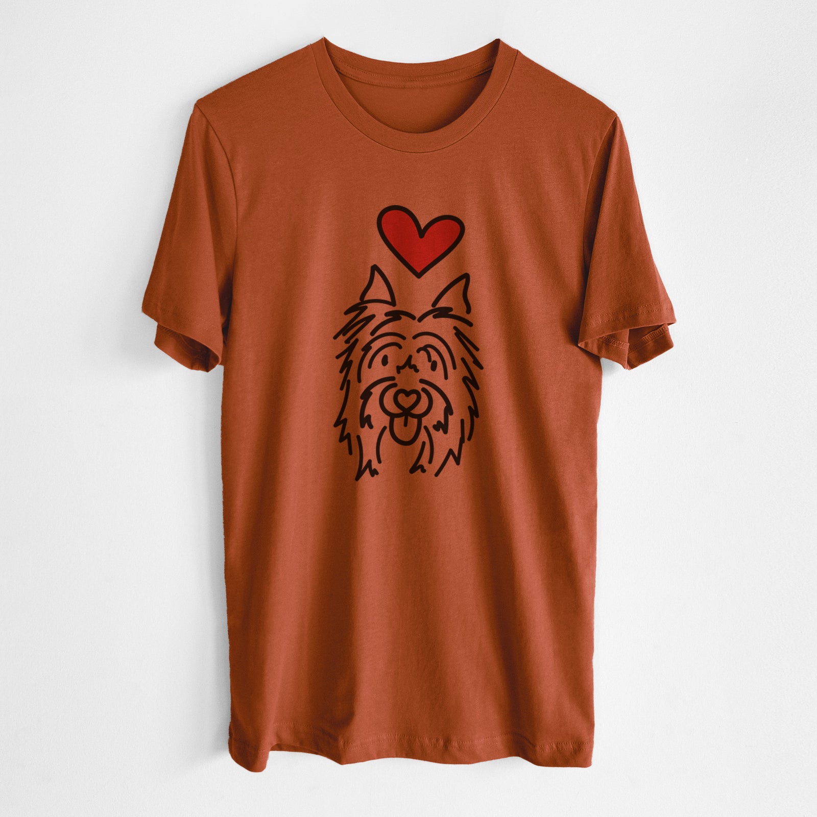 Minimalist line drawing of Monty the Silky Terrier with a red heart on an Autumn Unisex crewneck, worn by a man