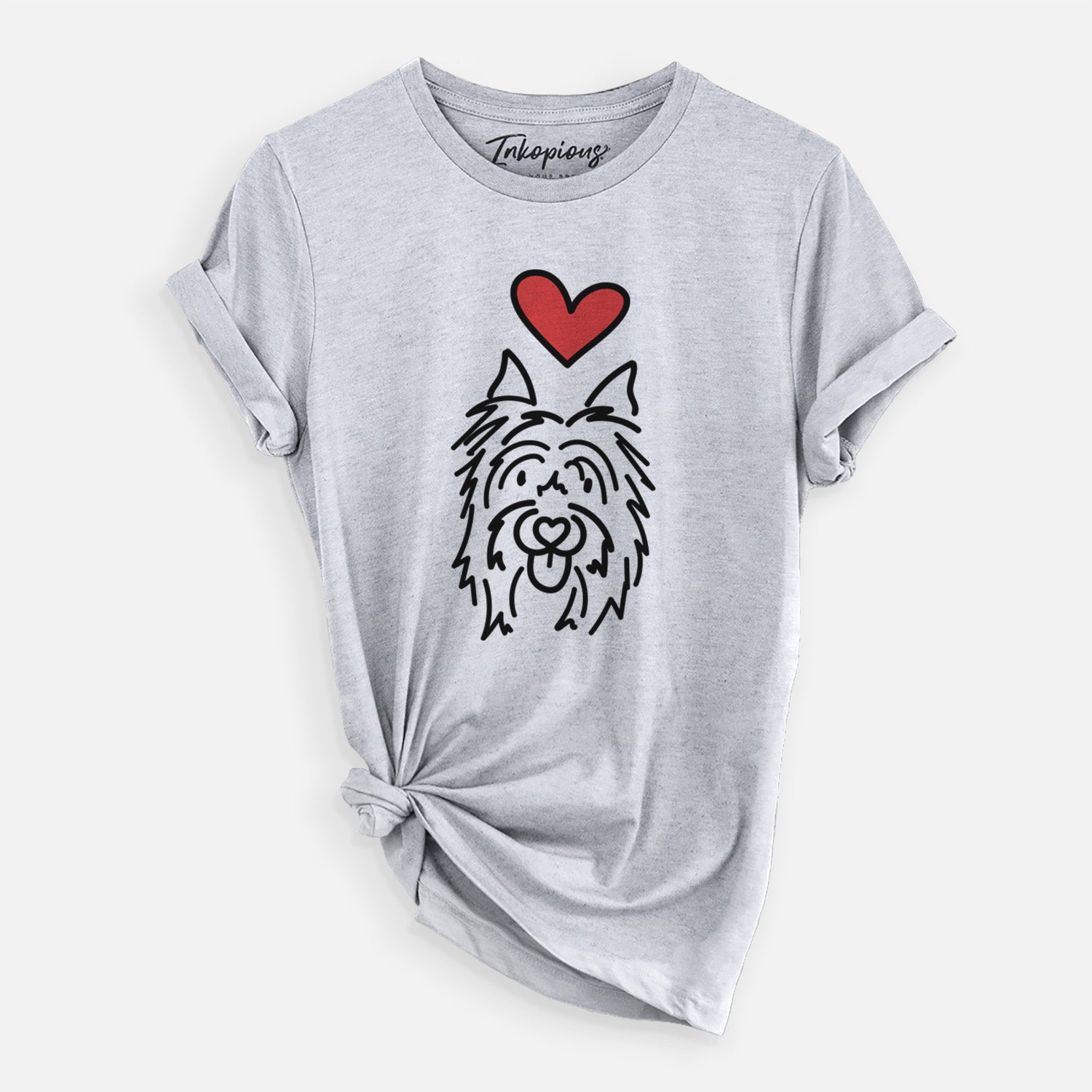 Minimalist line drawing of Monty the Silky Terrier with a red heart on a Grey Unisex crewneck, worn by a woman
