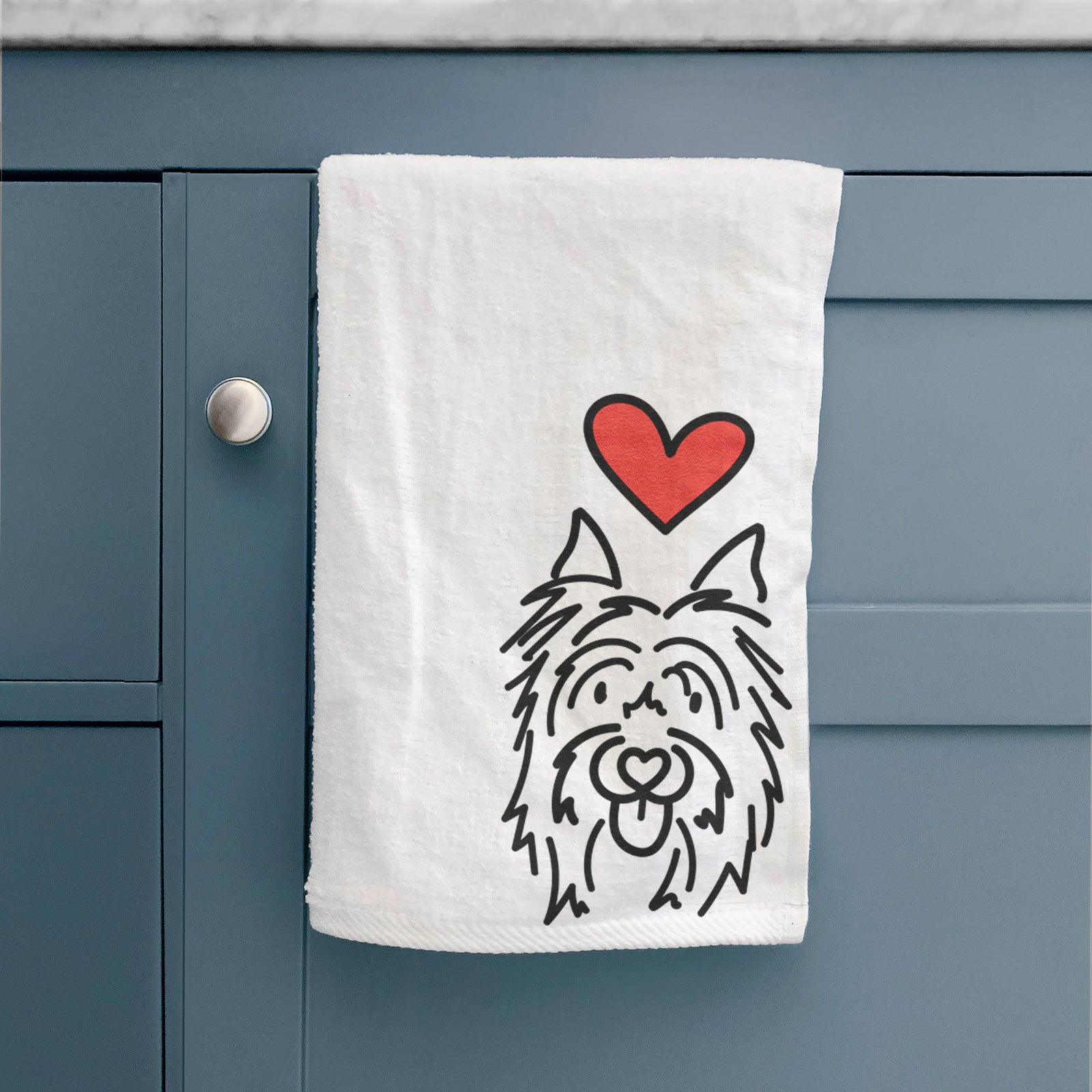 Minimalist line drawing of Monty the Silky Terrier with a red heart on a hand towel