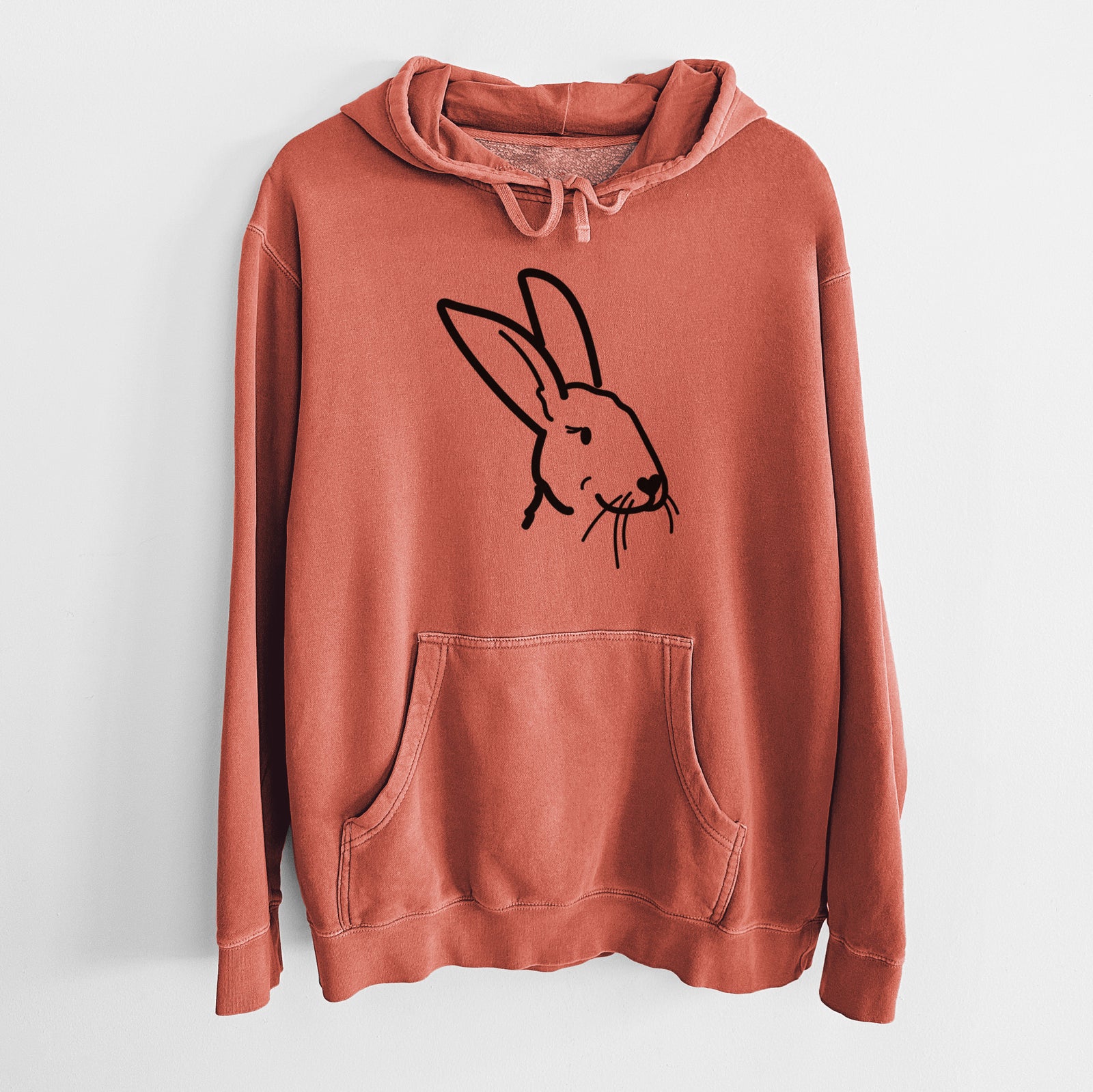 Minimalist line drawing of Betsy the Rex Rabbit on an Amber Unisex pigment dyed hoodie