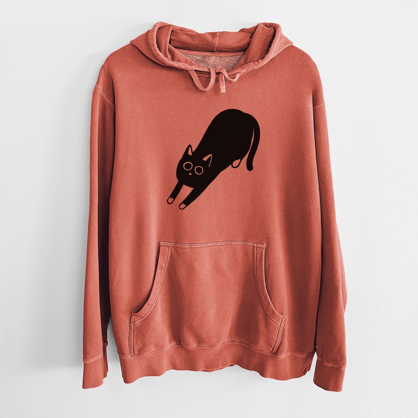 Minimalist line drawing of Bug the Black Cat on an Amber Unisex pigment dyed hoodie
