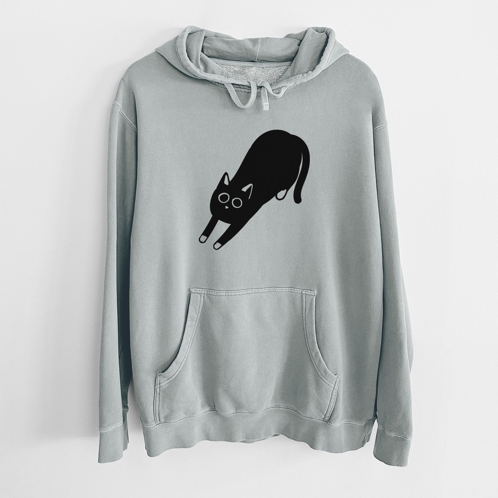 Minimalist line drawing of Bug the Black Cat on a Sage Unisex pigment dyed hoodie