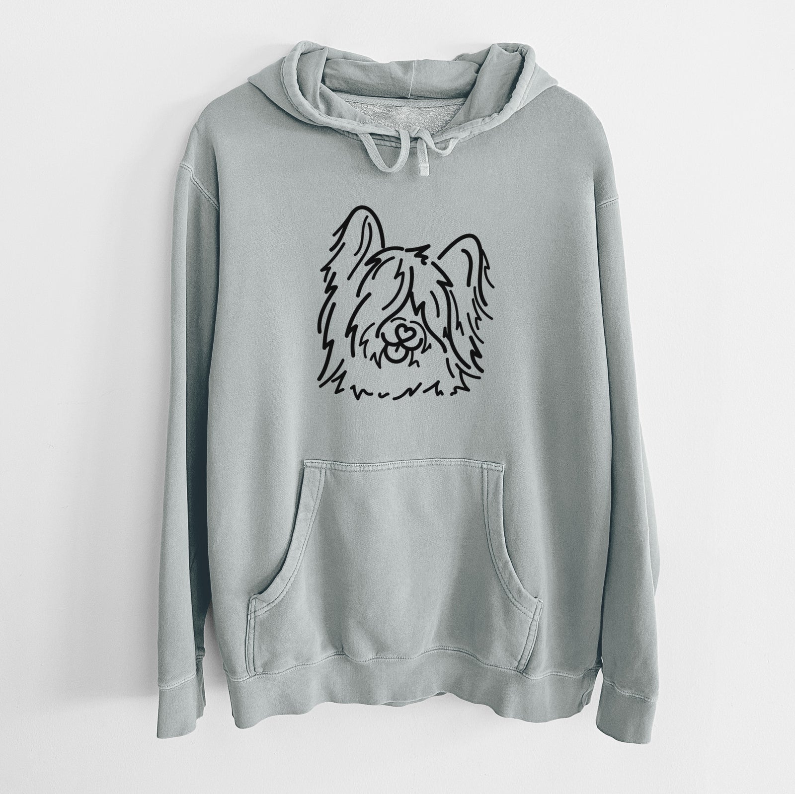 Minimalist line drawing of Dougal the Skye Terrier on a Sage Unisex pigment dyed hoodie