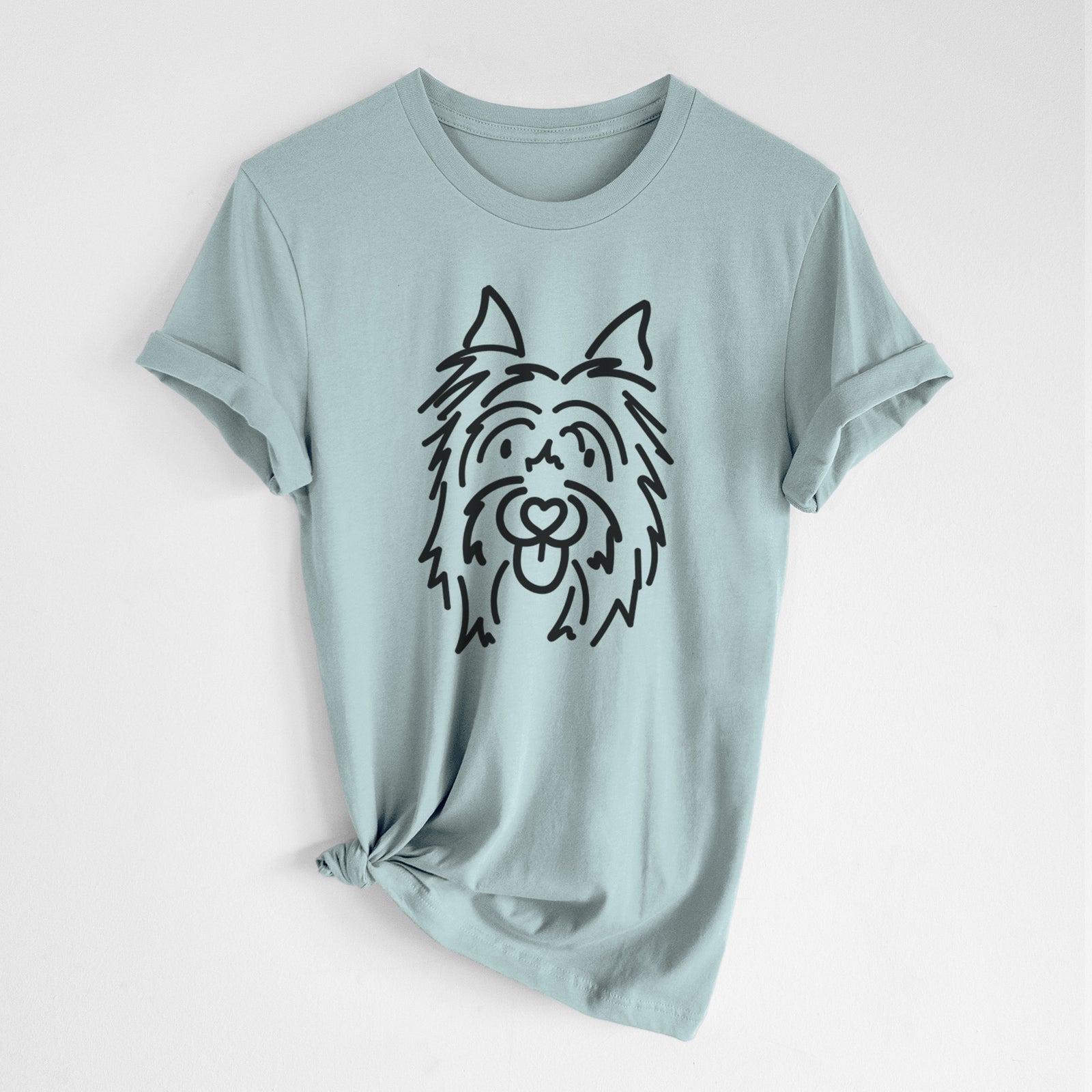 Minimalist line drawing of Monty the Silky Terrier on a Dusty Blue Unisex crewneck, worn by a woman