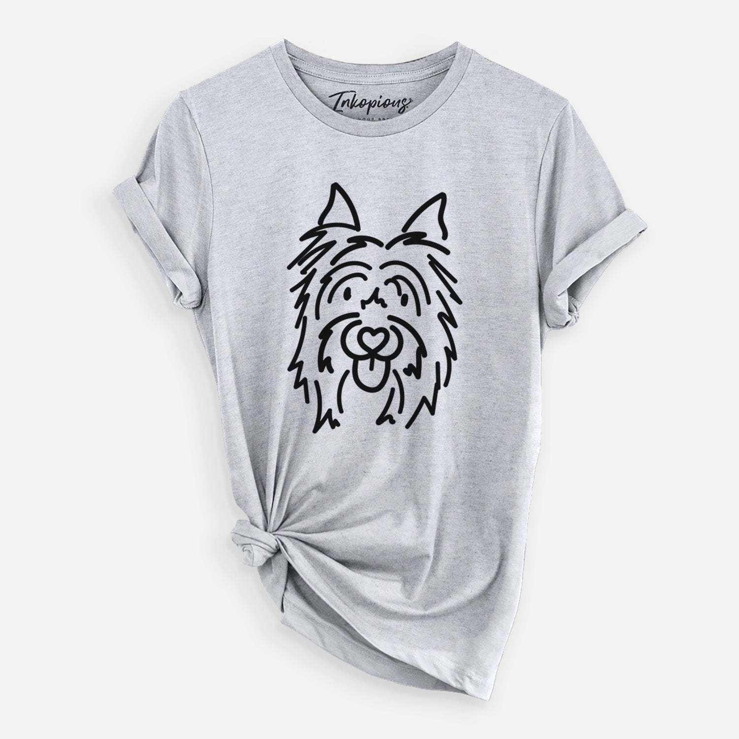 Minimalist line drawing of Monty the Silky Terrier on a Grey Unisex crewneck, worn by a woman