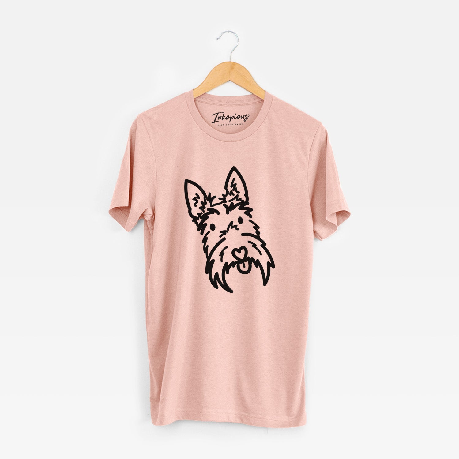 Minimalist line drawing of Thistle the Scottish Terrier on a Peach Unisex crewneck