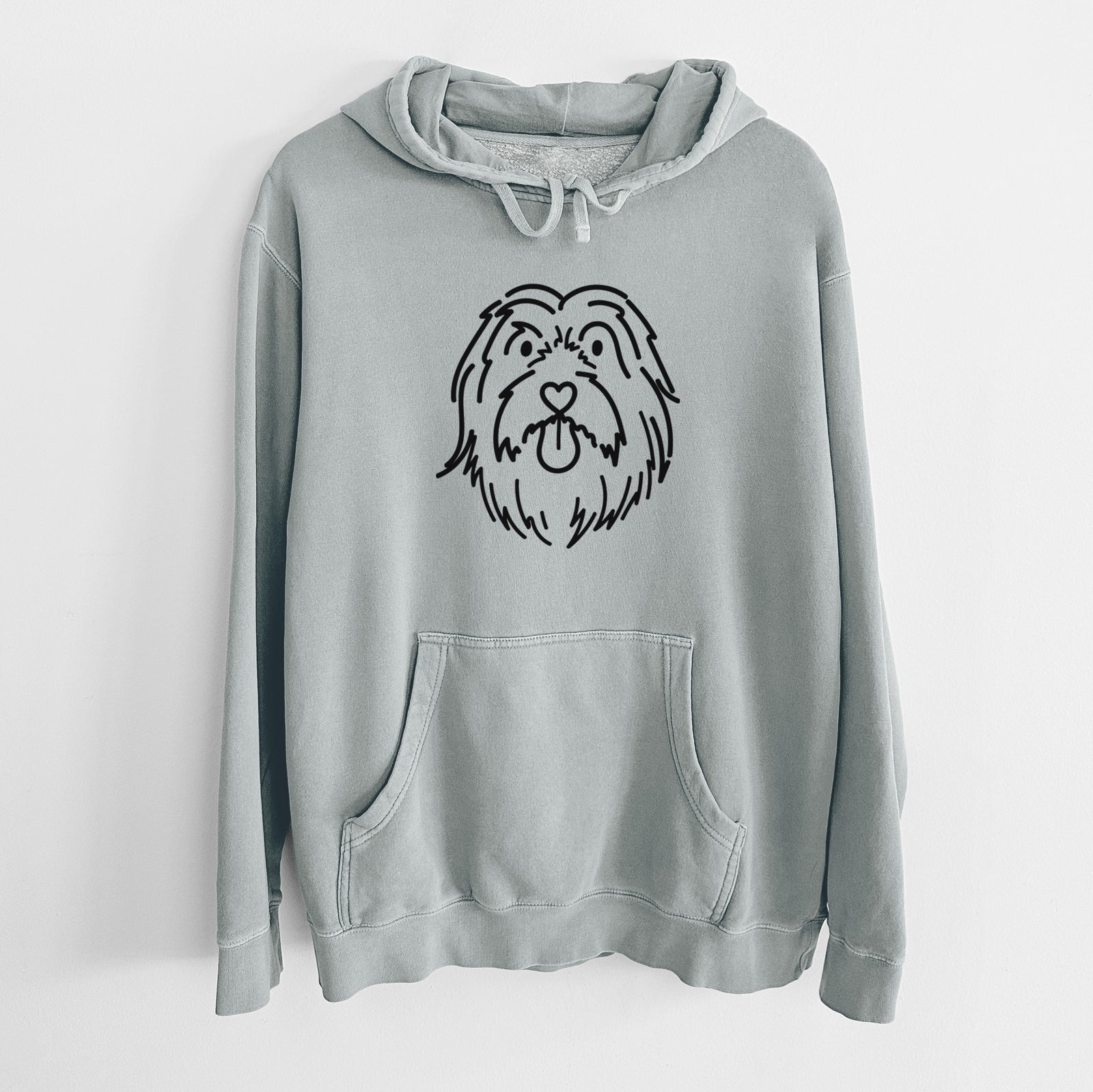 Minimalist line drawing of Tucker the Bearded Collie on a Sage Unisex pigment dyed hoodie
