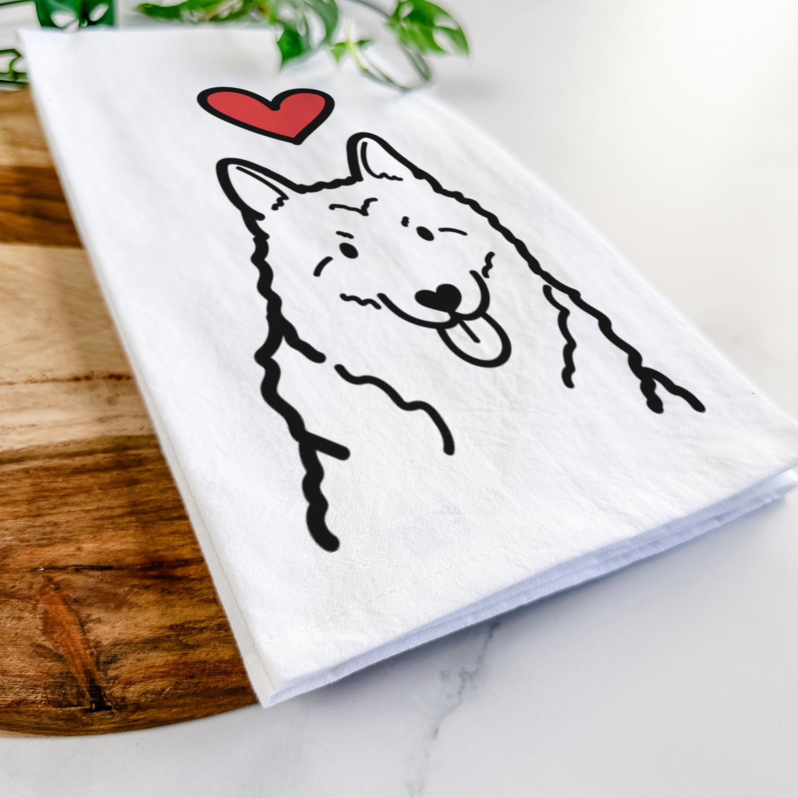Minimalist line drawing of a Norwegian Elkhound with a red heart on a tea towel