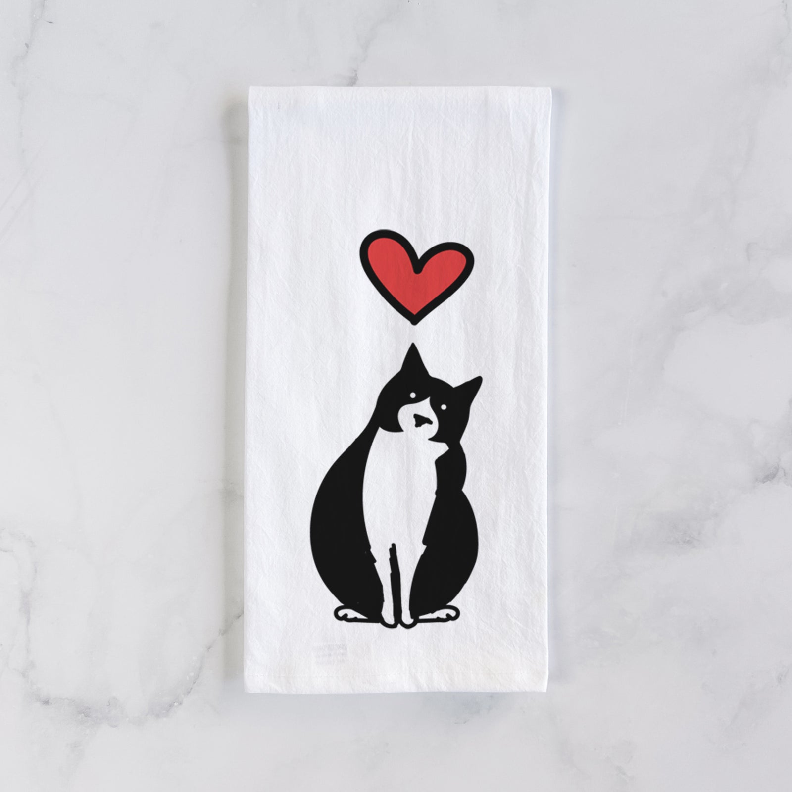 Minimalist line drawing of Oliver the Tuxedo Cat with a red heart on a tea towel