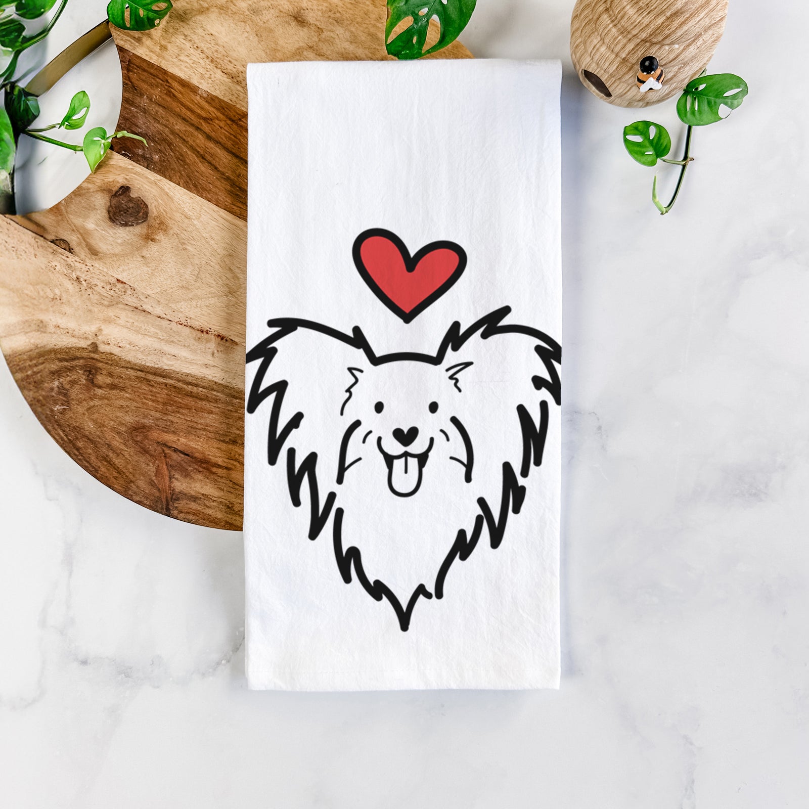 Minimalist line drawing of a Papillon with a red heart on a tea towel