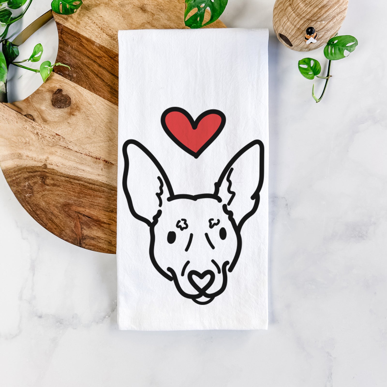 Minimalist line drawing of Penny the Rat Terrier with a red heart on a tea towel