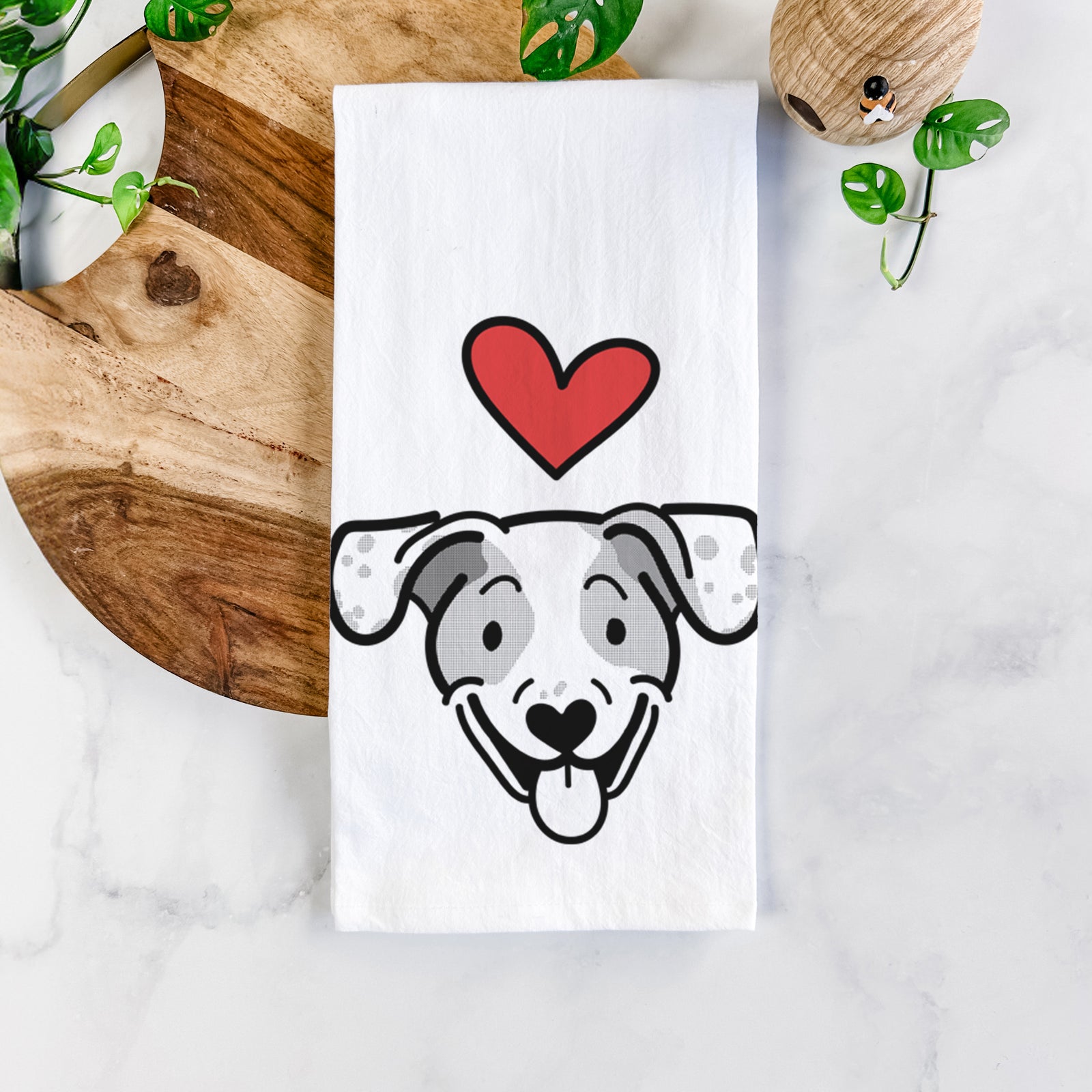 Minimalist line drawing of Roland the Beagle Mix with a red heart on a tea towel