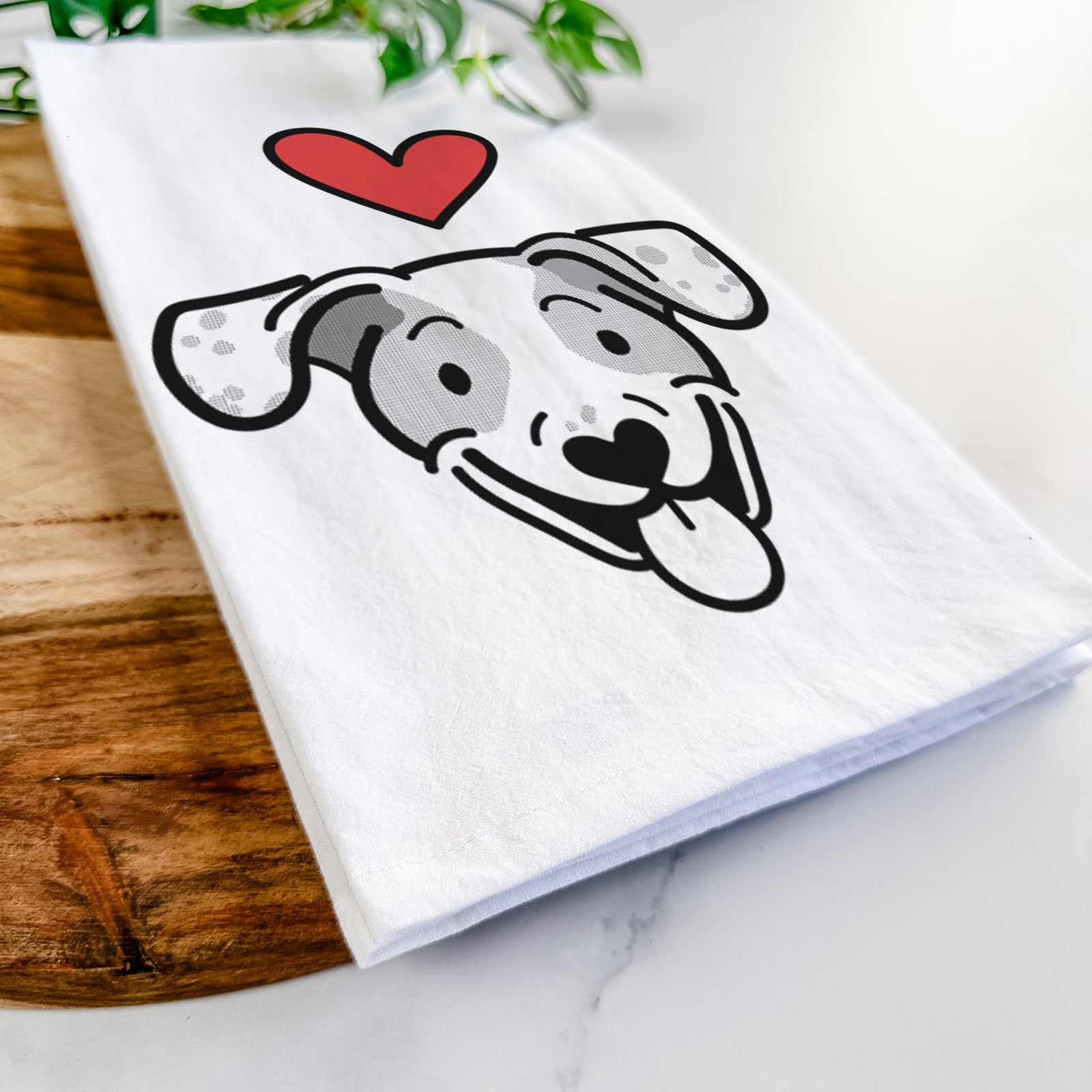 Minimalist line drawing of Roland the Beagle Mix with a red heart on a tea towel