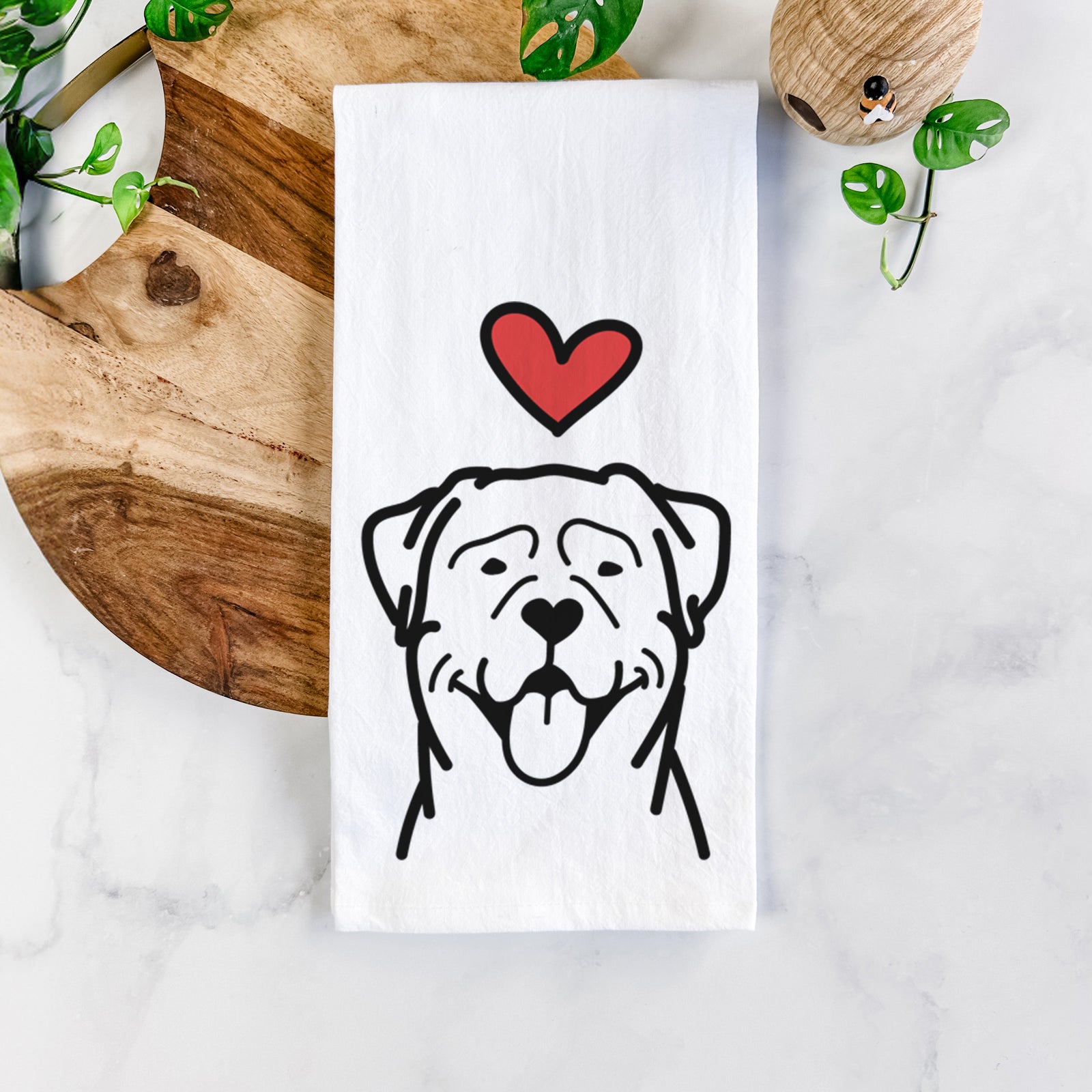Minimalist line drawing of a Rottweiler with a red heart on a tea towel