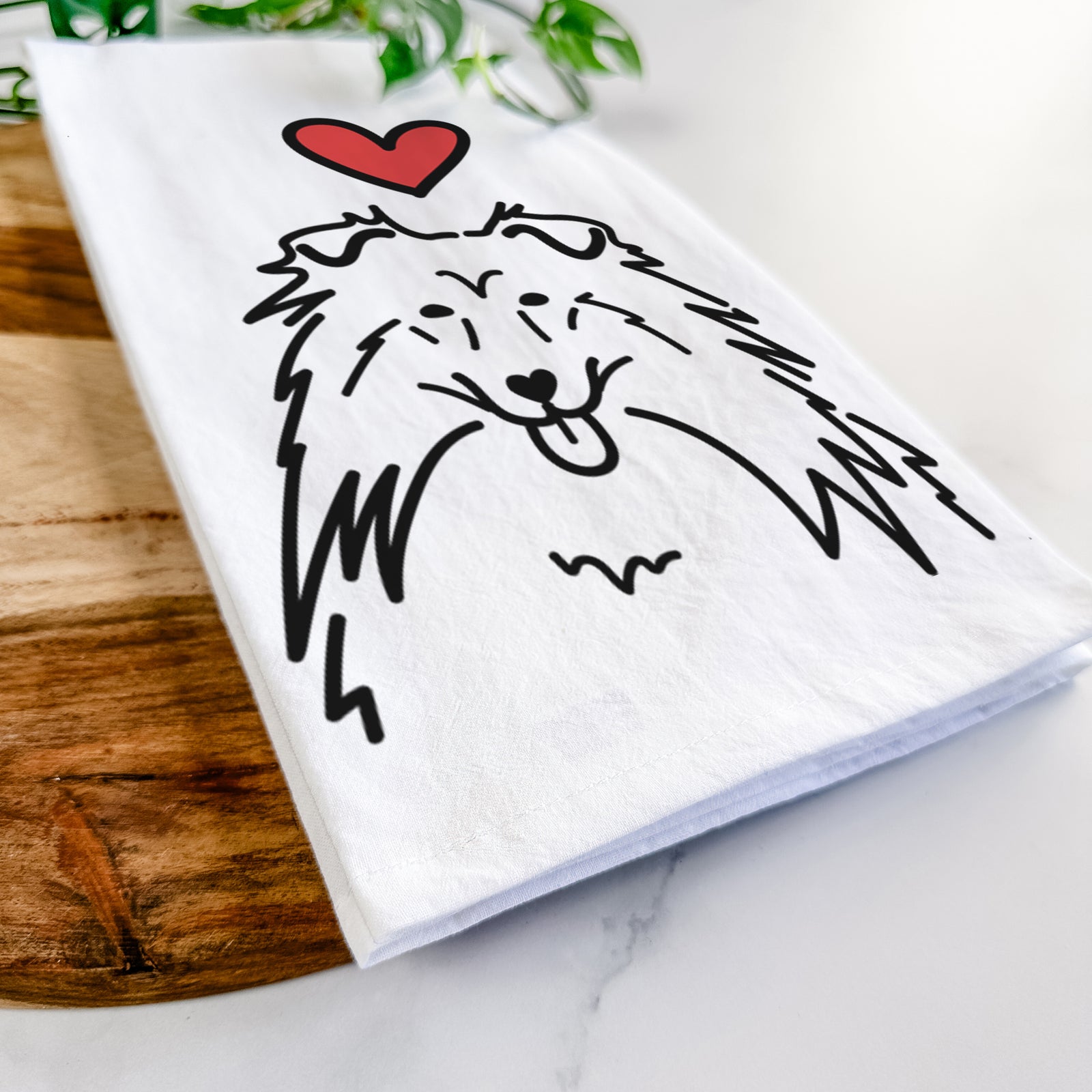 Minimalist line drawing of a Rough Collie with a red heart on a tea towel