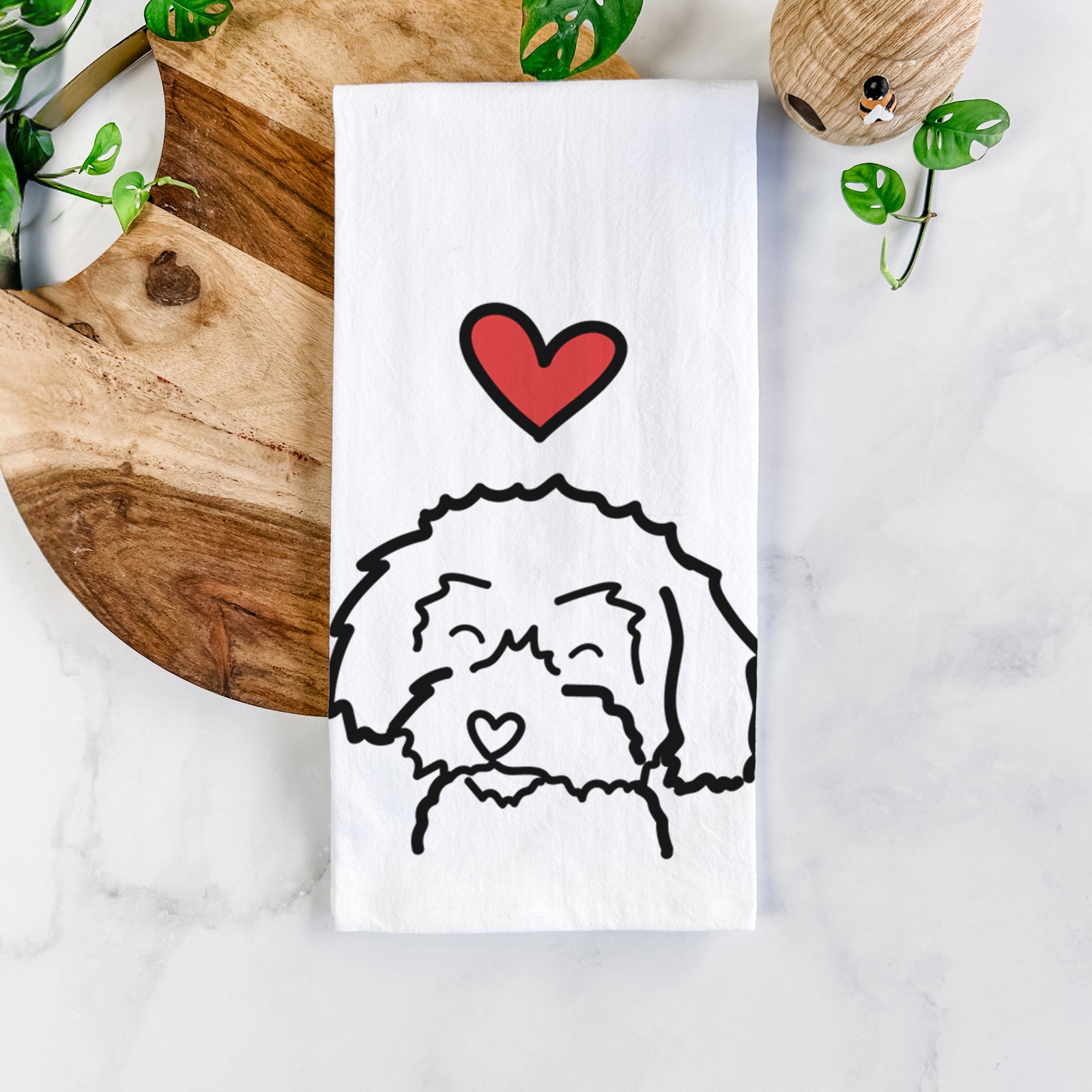 Minimalist line drawing of a Schnoodle with a red heart on a tea towel