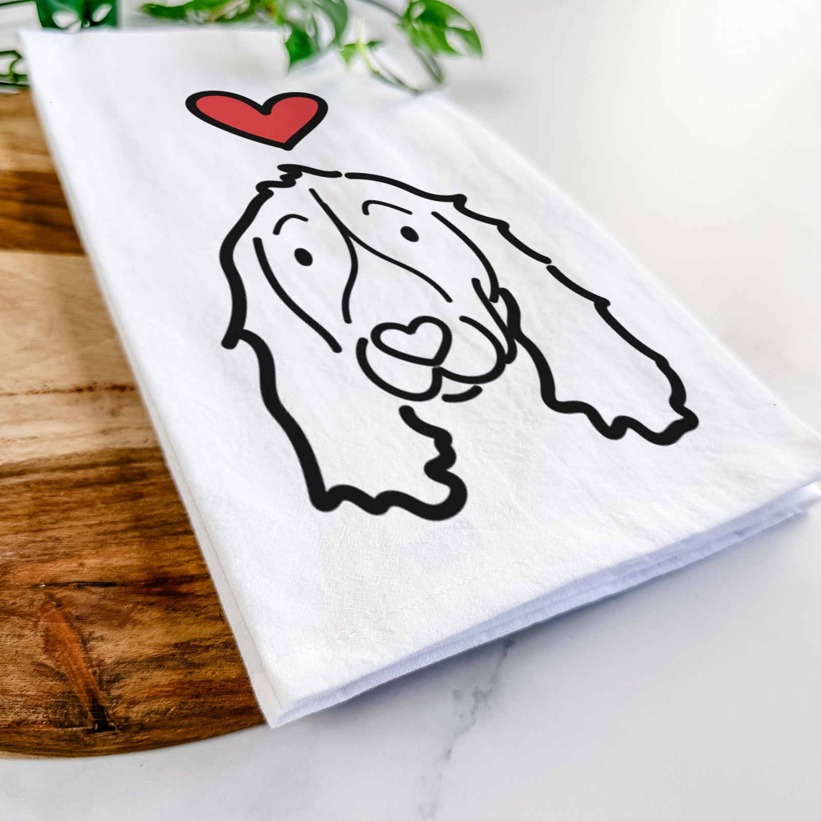 Minimalist line drawing of an English Springer Spaniel with a red heart on a tea towel