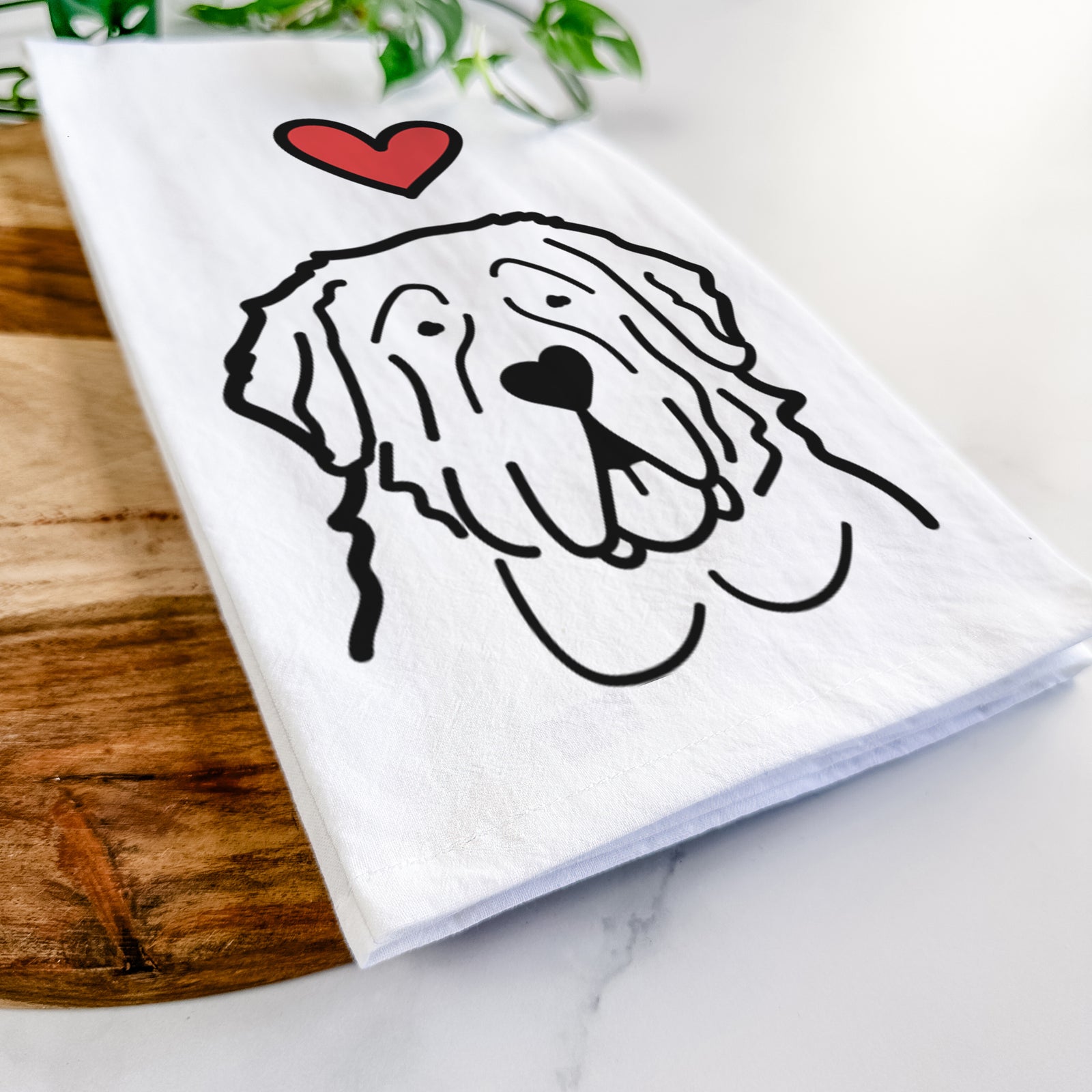Minimalist line drawing of a Saint Bernard with a red heart on a tea towel