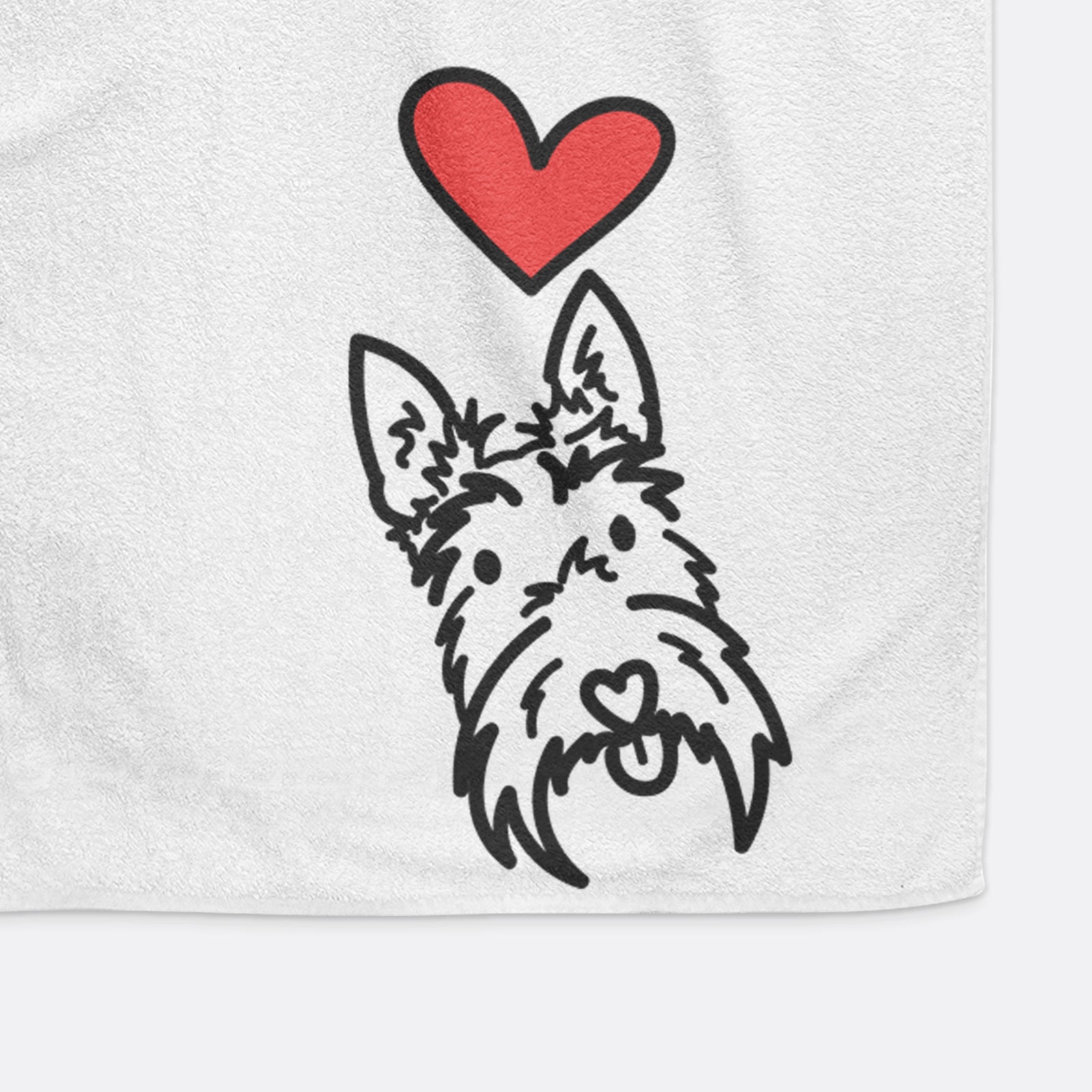 Minimalist line drawing of Thistle the Scottish Terrier with a red heart on a decorative hand towel
