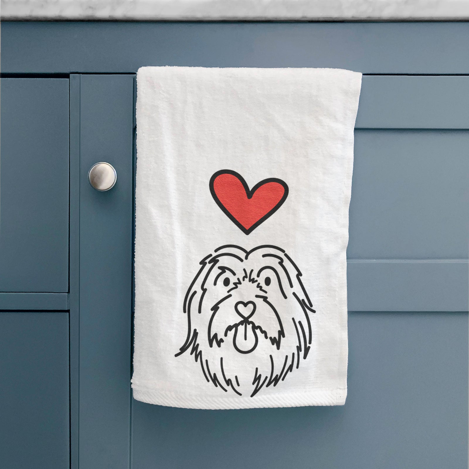 Minimalist line drawing of Tucker the Bearded Collie with a red heart on a decorative hand towel