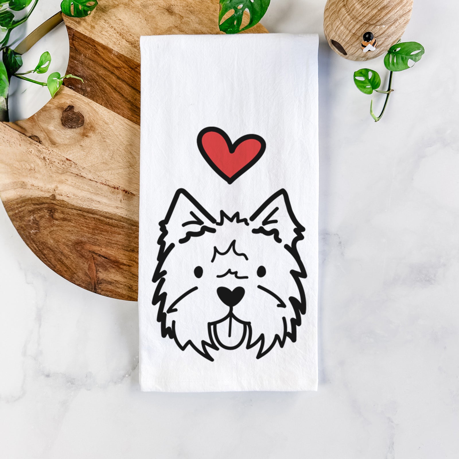 Minimalist line drawing of a West Highland Terrier with a red heart on a tea towel