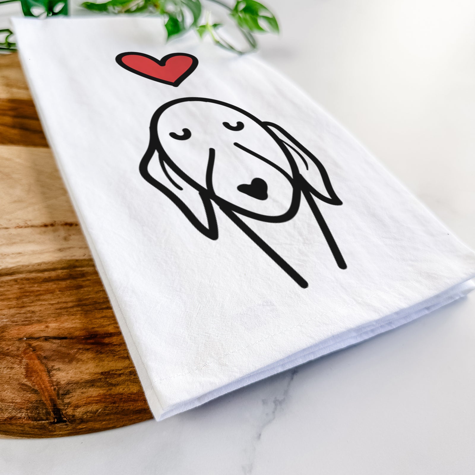 Minimalist line drawing of a Whippet with a red heart on a tea towel