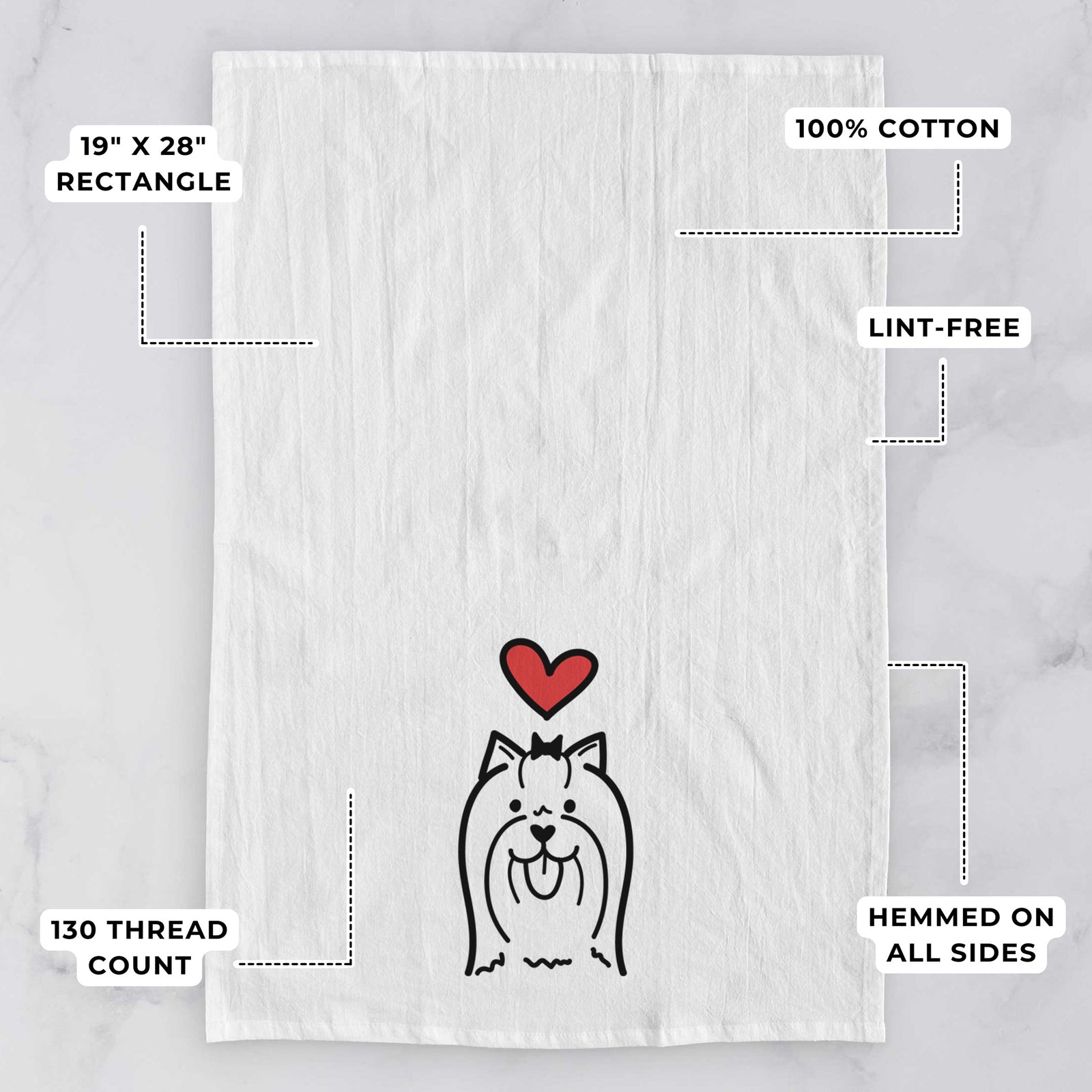 Minimalist line drawing of a Yorkshire Terrier with a red heart on a tea towel, with feature callouts: 19 x 28 inch rectangle, 100% cotton, lint-free, 120 thread count, hemmed on all sides