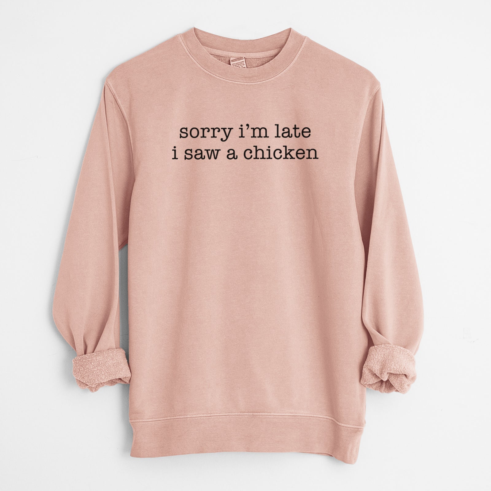 'Sorry I'm Late I Saw a Chicken' design on a Dusty Pink Unisex pigment dyed crew sweatshirt