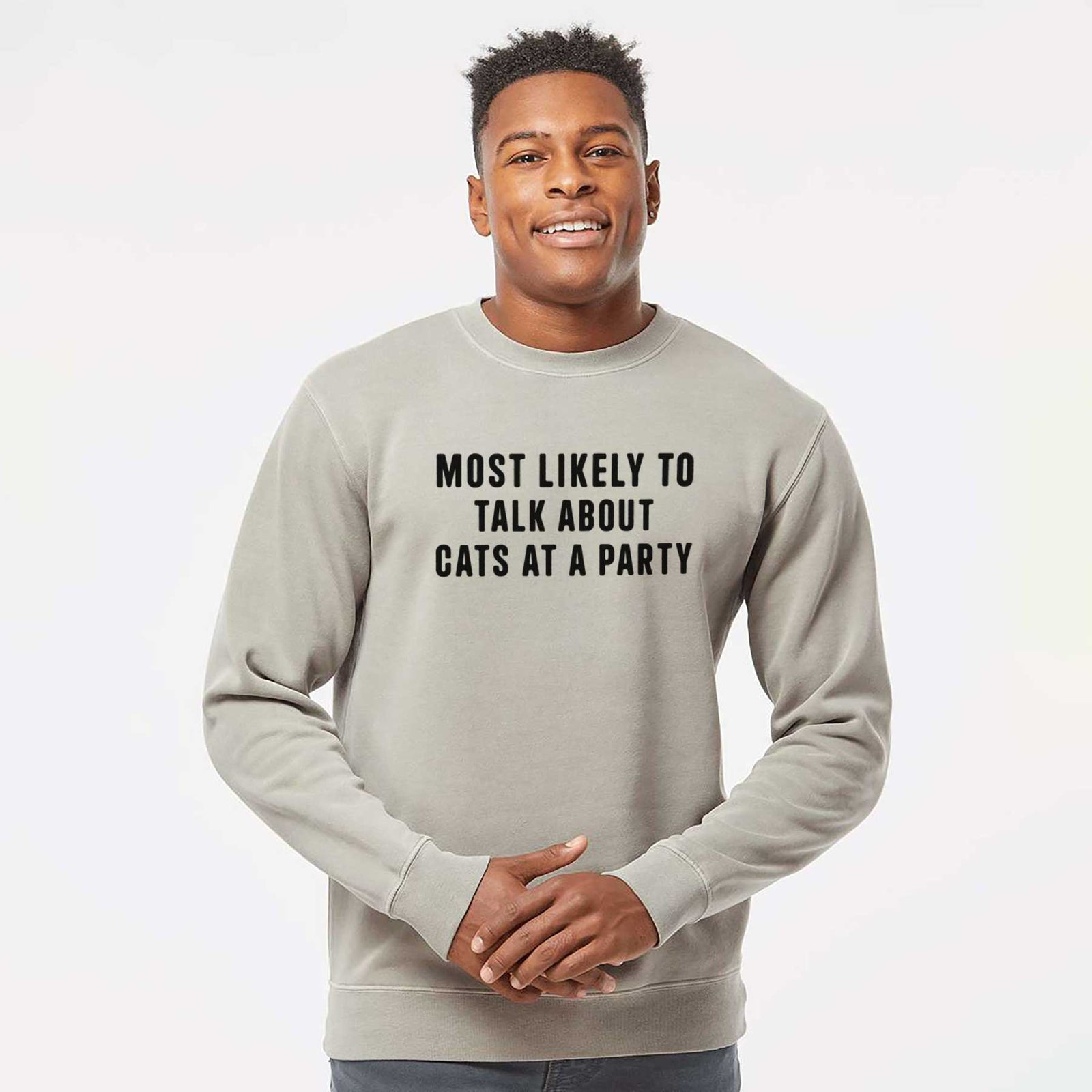 'Most Likely to Talk About Cats at a Party' design on a Cement Unisex pigment dyed crew sweatshirt