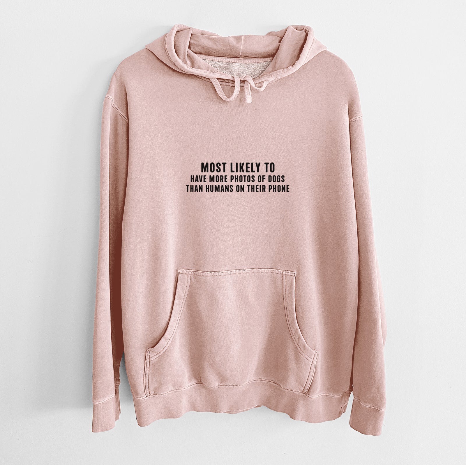 'Most Likely to Have More Photos of Dogs than Humans on their Phone' design on a Dusty Pink Unisex pigment dyed hoodie