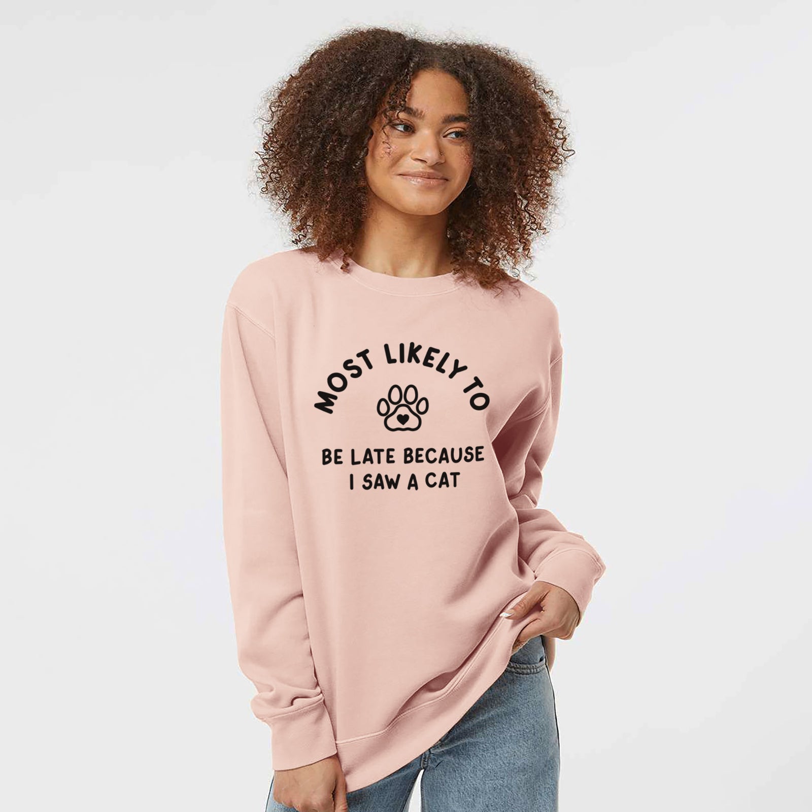 'Most Likely to Be Late Because I Saw a Cat' design on a Dusty Pink Unisex pigment dyed crew sweatshirt