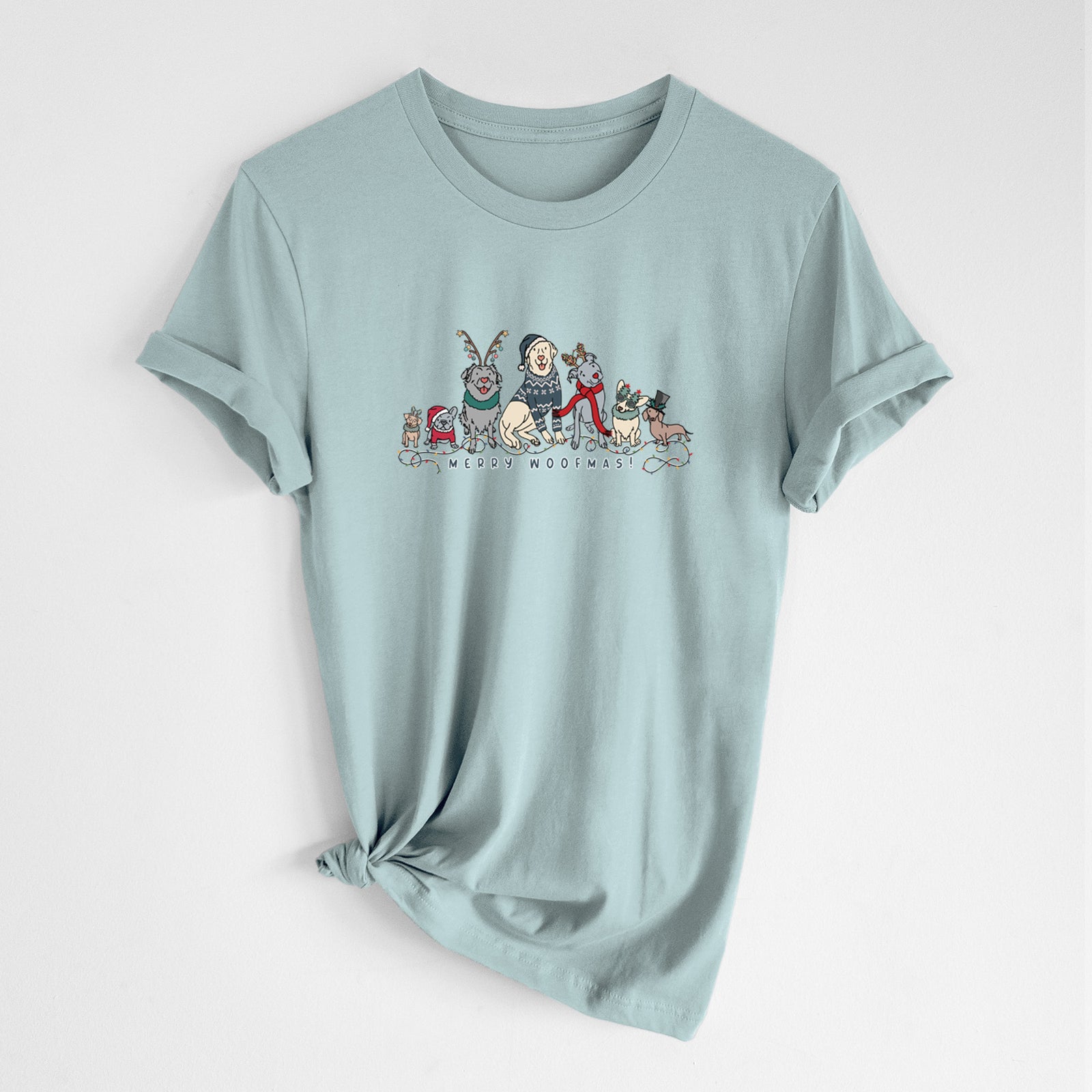 'Merry Woofmas' design on a Dusty Blue Unisex crewneck, worn by a woman