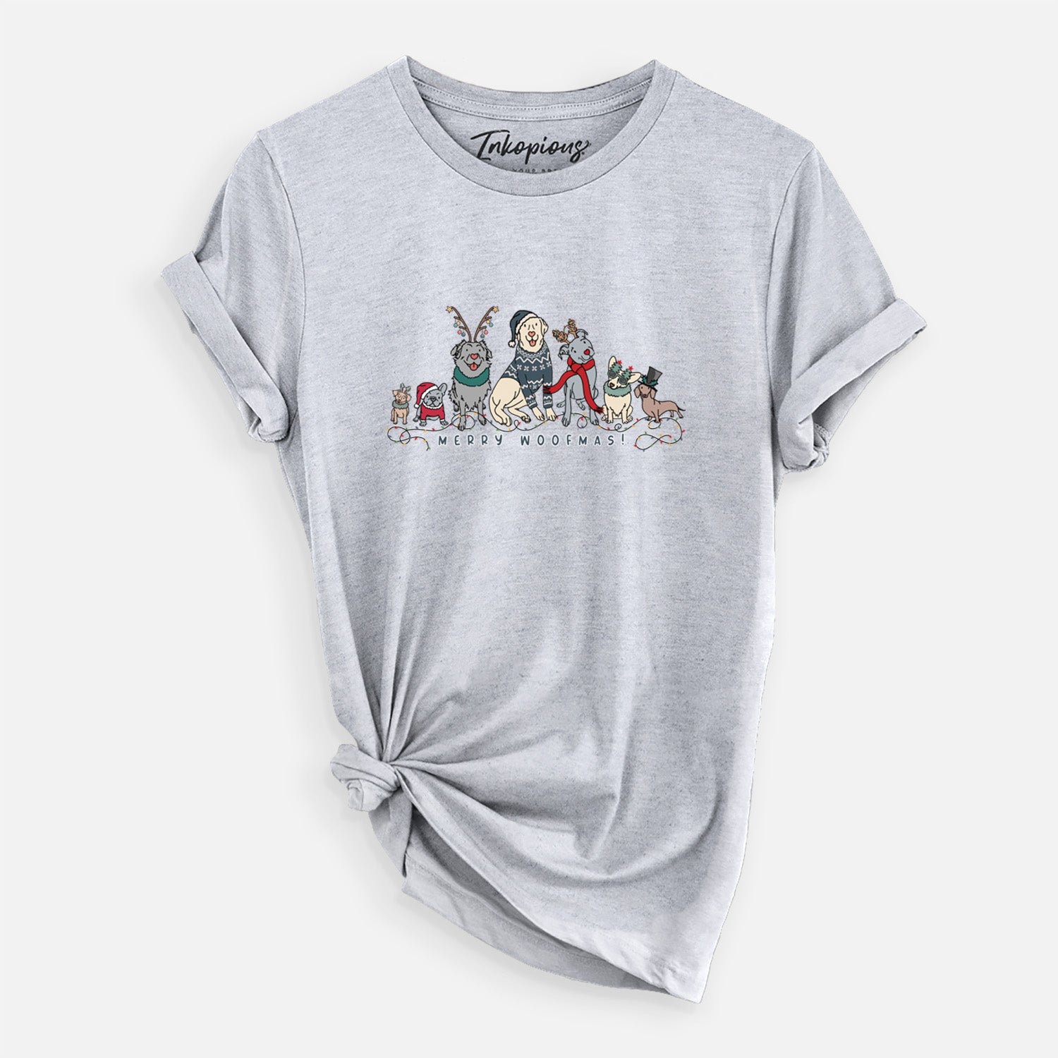 'Merry Woofmas' design on a Grey Unisex crewneck, worn by a woman