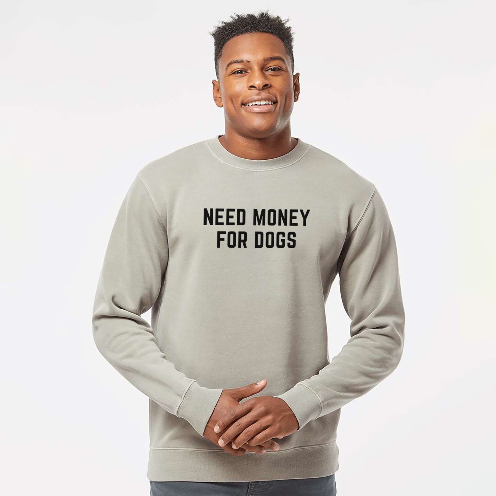 'Need Money for Dogs' design on a Cement Unisex pigment dyed crew sweatshirt