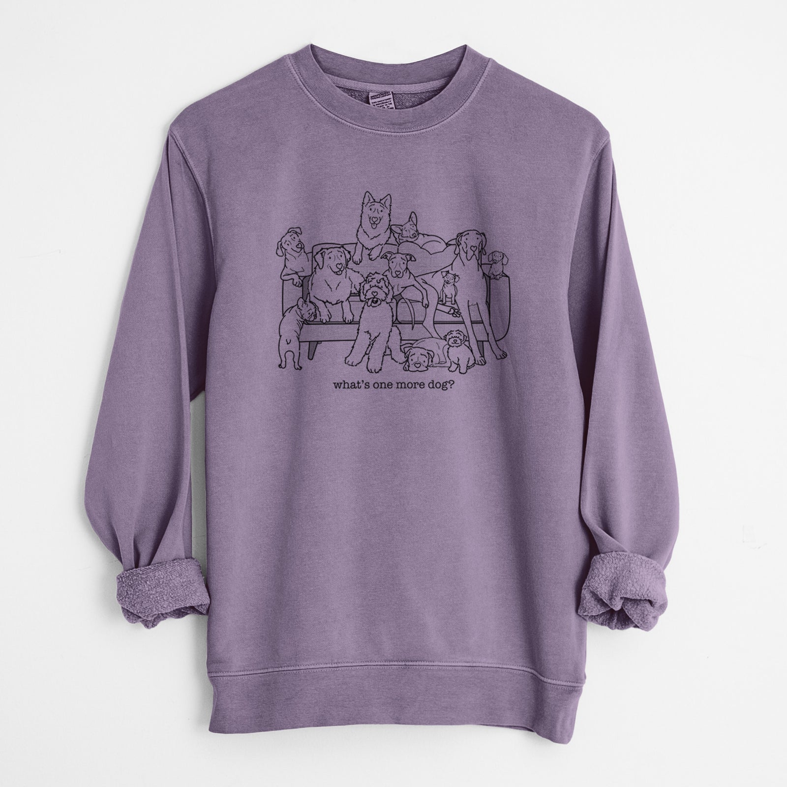 'What's One More Dog?' design on a Plum Unisex pigment dyed crew sweatshirt