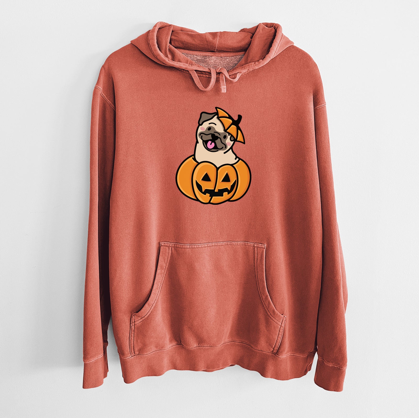'Pumpkin Pup - Pug' design on an Amber Unisex pigment dyed hoodie