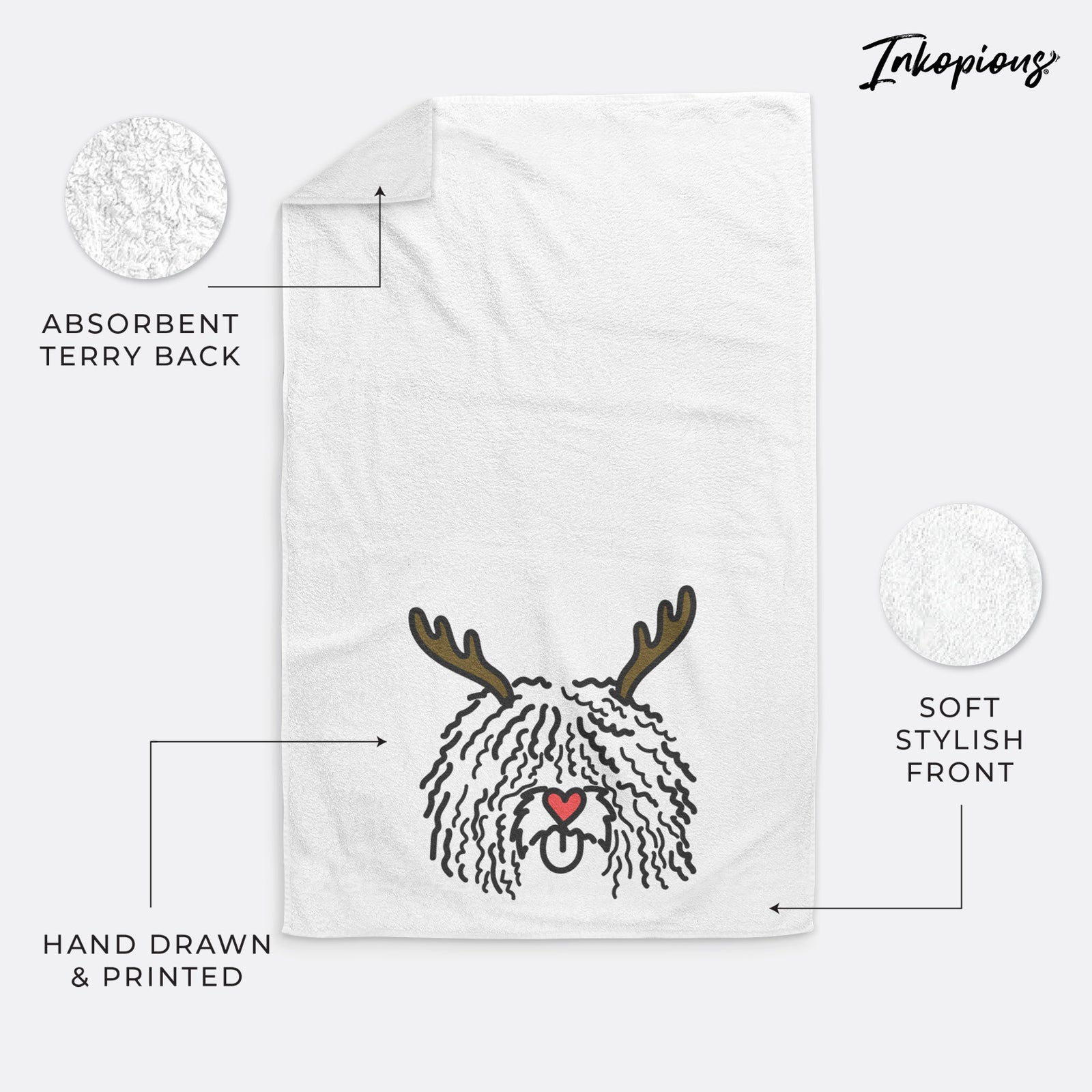 Minimalist line drawing of Alba the Spanish Water Dog with reindeer antlers and a red nose on a decorative hand towel