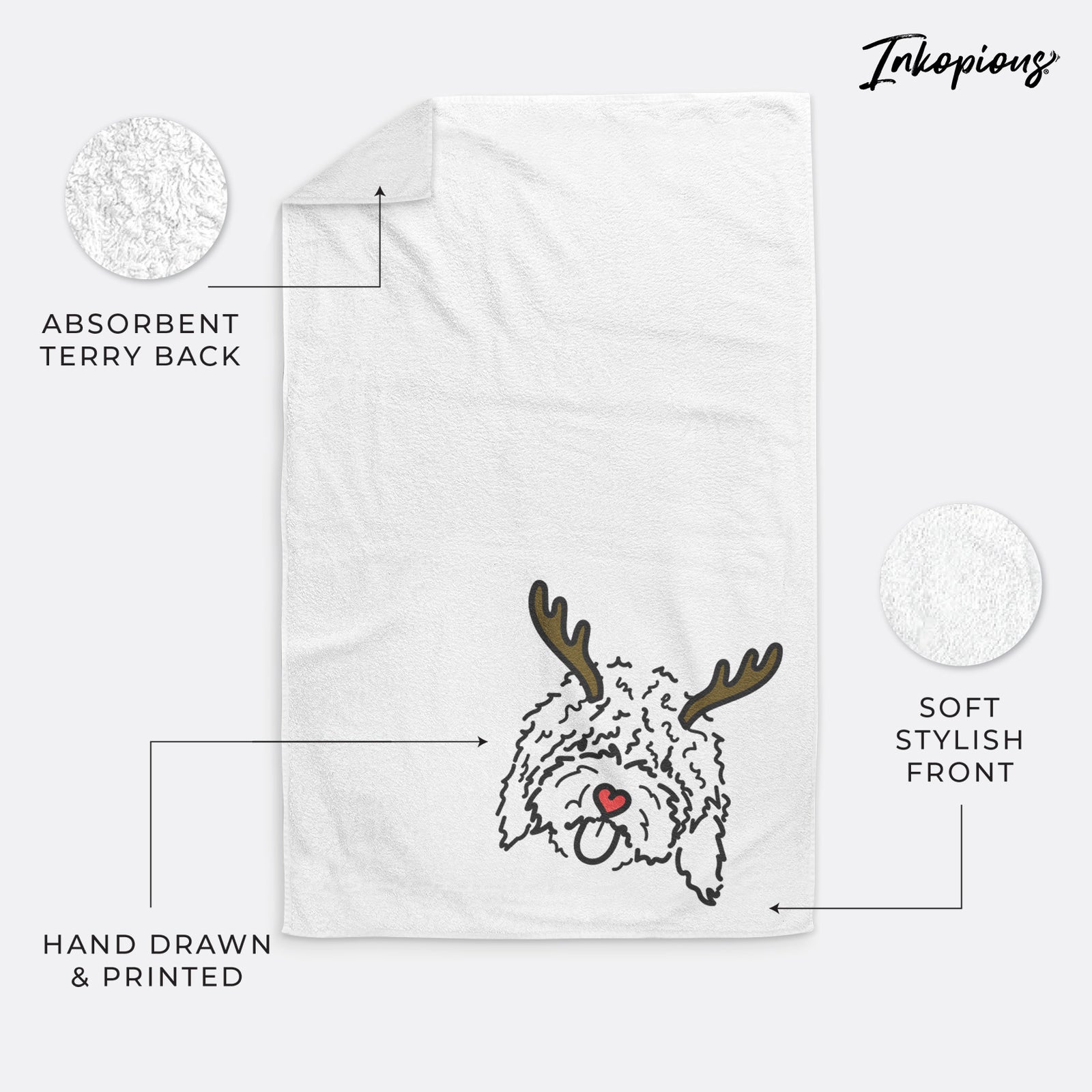 Minimalist line drawing of Antonio the Spanish Water Dog with reindeer antlers and a red nose on a decorative hand towel
