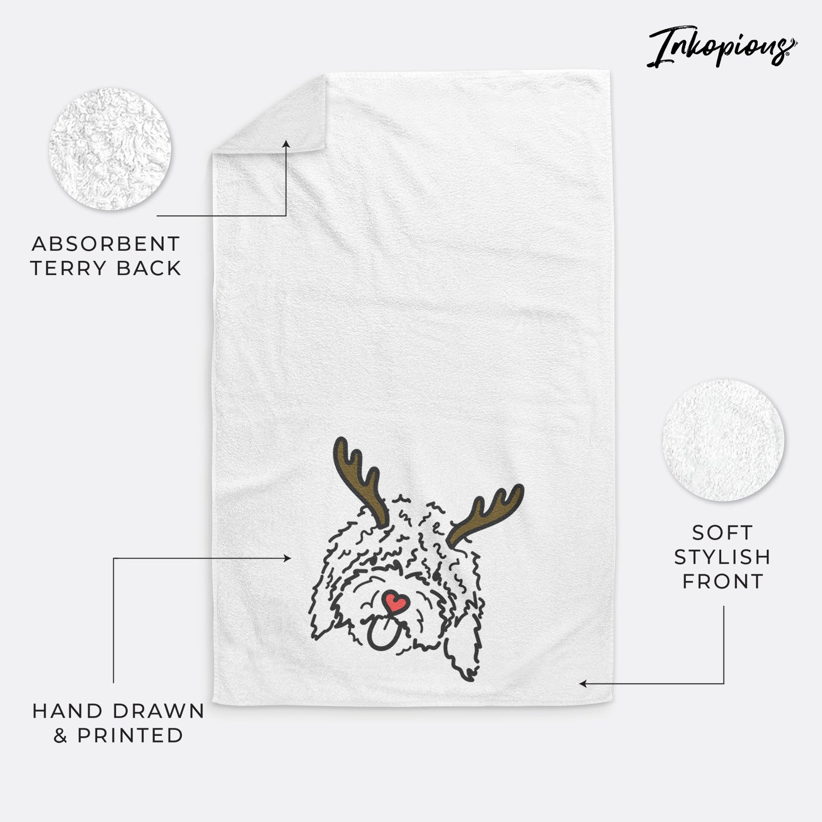 Minimalist line drawing of Antonio the Spanish Water Dog with reindeer antlers and a red nose on a decorative hand towel