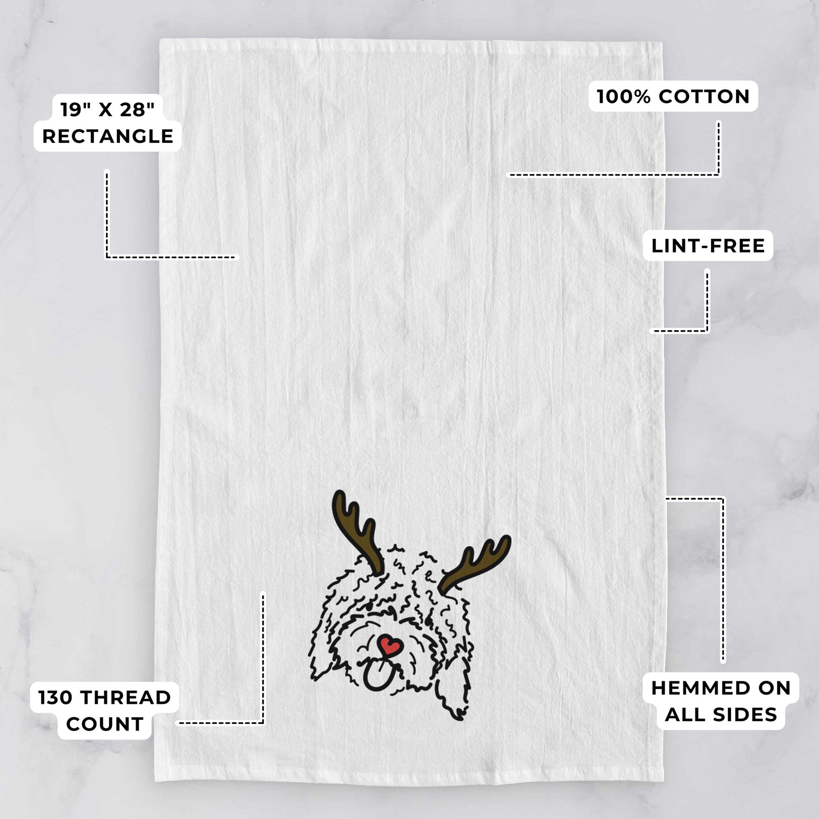 Minimalist line drawing of Antonio the Spanish Water Dog with reindeer antlers and a red nose on a tea towel, with feature callouts: 19 x 28 inch rectangle, 100% cotton, lint-free, 120 thread count, hemmed on all sides