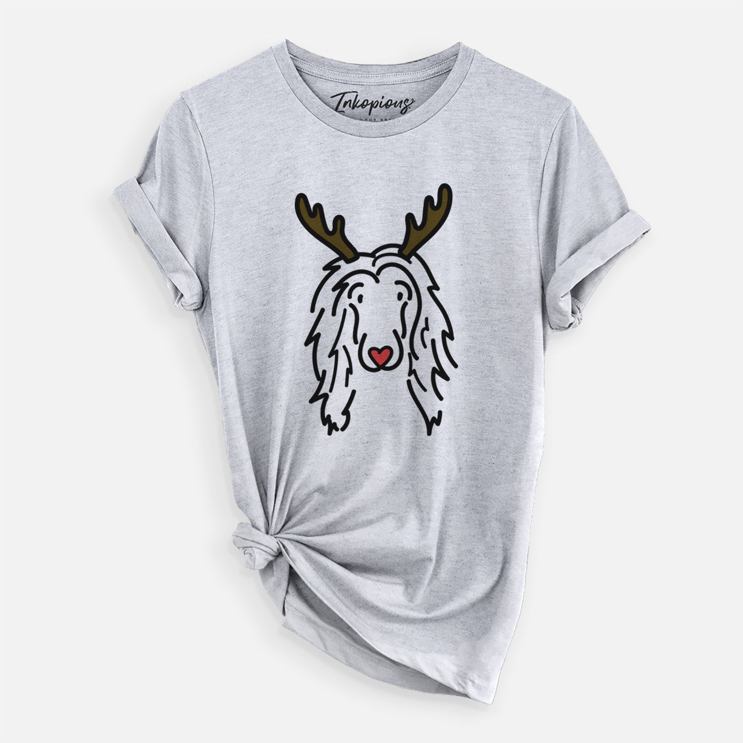 Minimalist line drawing of Asher the Afghan Hound with reindeer antlers and a red nose on a Grey Unisex crewneck, worn by a woman