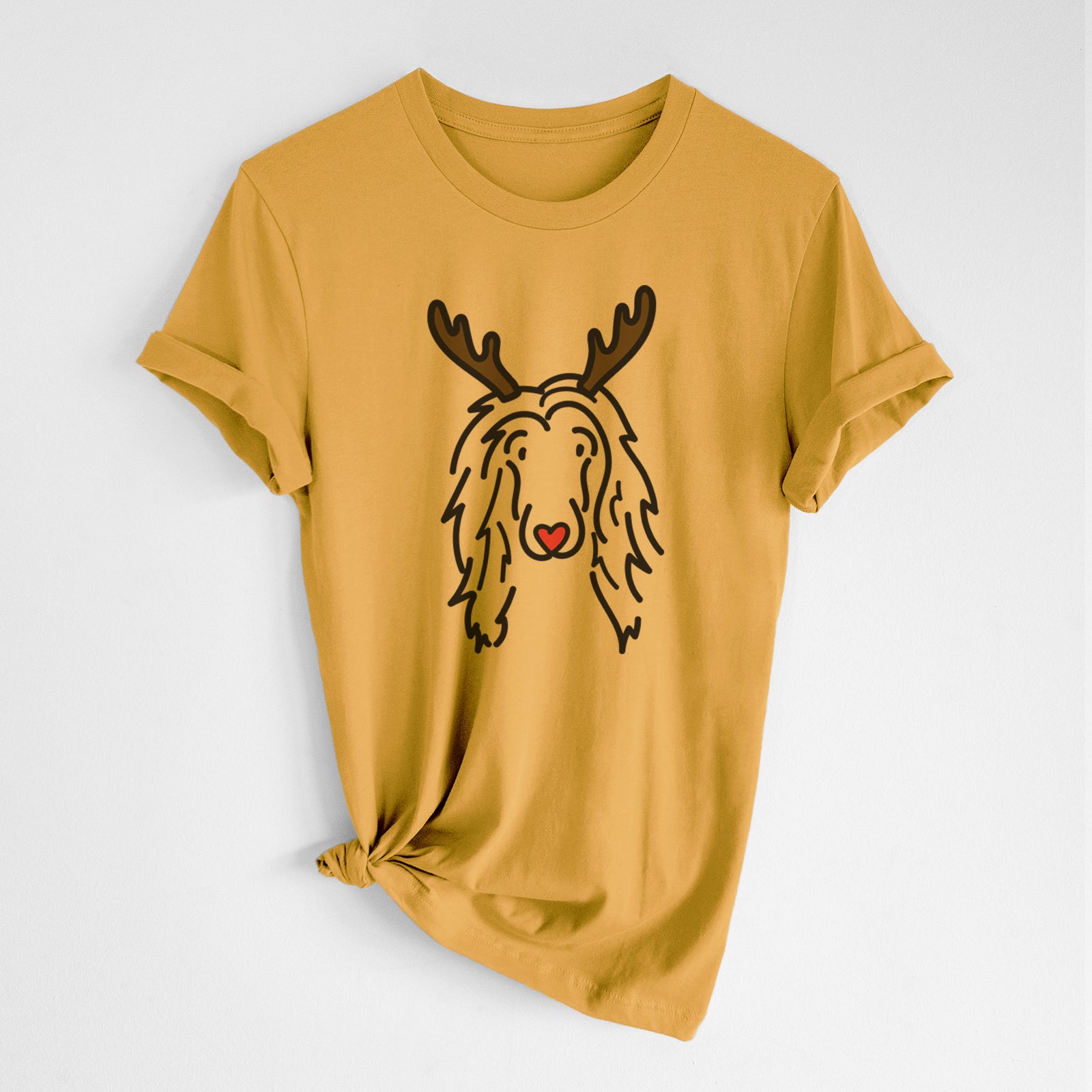 Minimalist line drawing of Asher the Afghan Hound with reindeer antlers and a red nose on a Honeycomb Unisex crewneck, worn by a woman