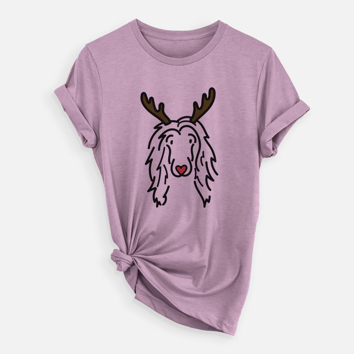 Minimalist line drawing of Asher the Afghan Hound with reindeer antlers and a red nose on an Orchid Unisex crewneck, worn by a woman