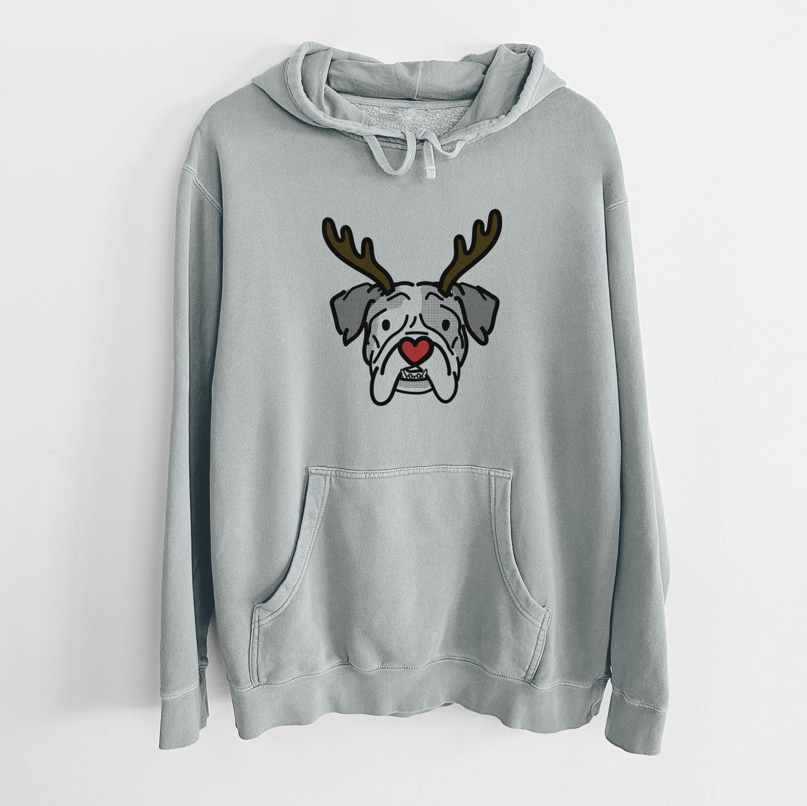 Minimalist line drawing of Bailey the English Bulldog with reindeer antlers and a red nose on a Sage Unisex pigment dyed hoodie