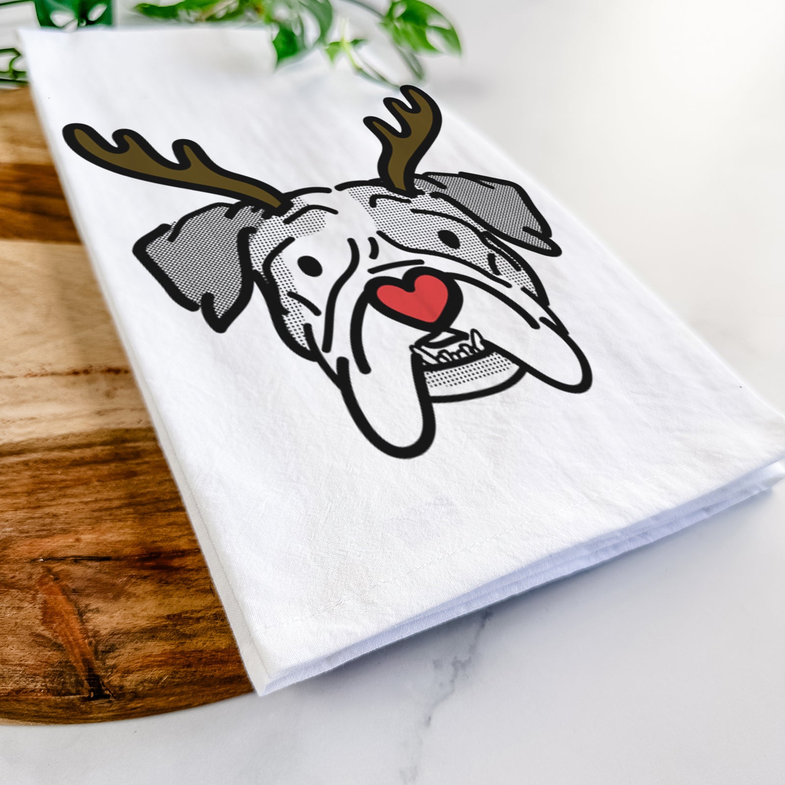 Minimalist line drawing of Bailey the English Bulldog with reindeer antlers and a red nose on a tea towel