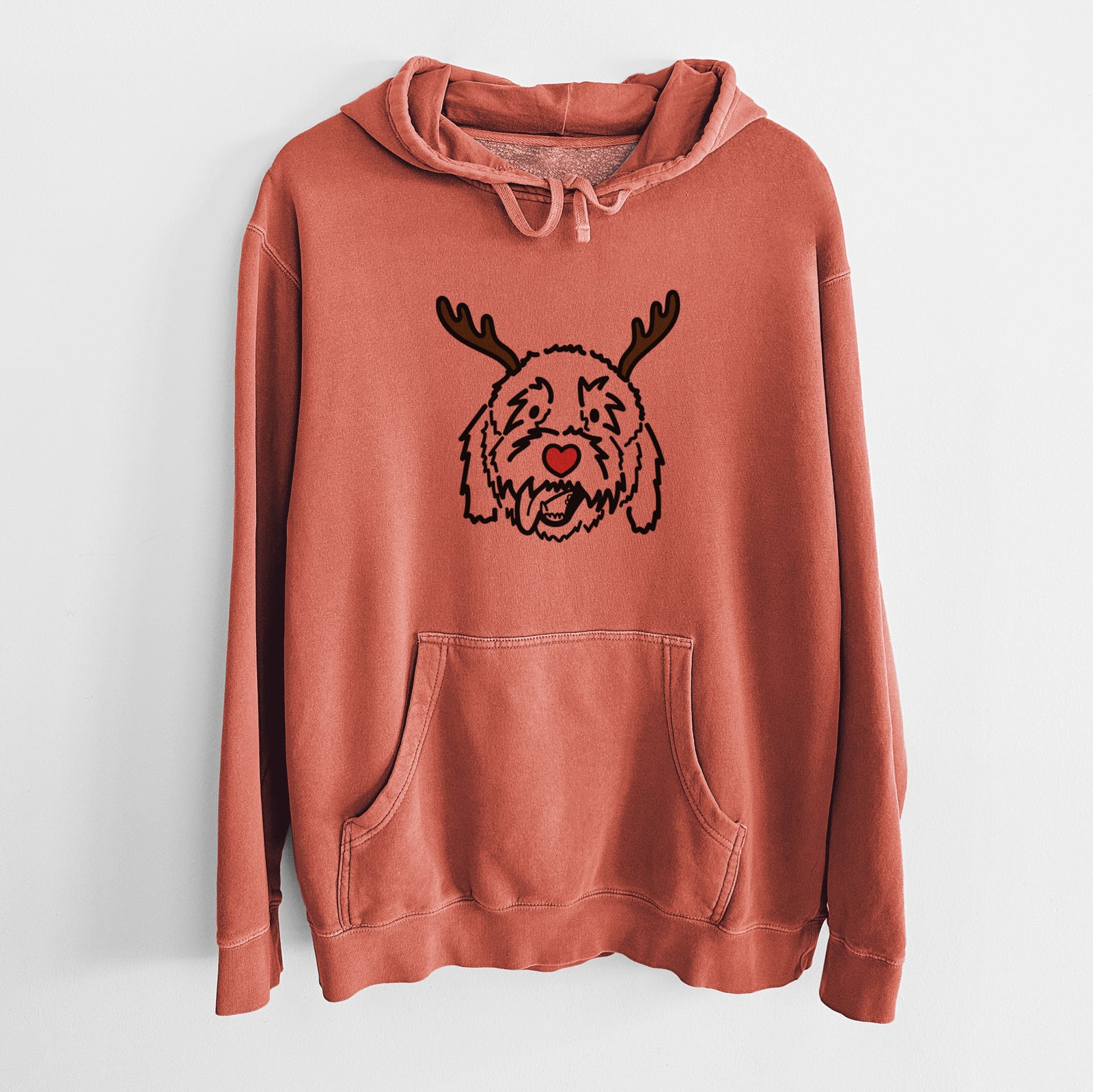Minimalist line drawing of Barry the Goldendoodle with reindeer antlers and a red nose on an Amber Unisex pigment dyed hoodie