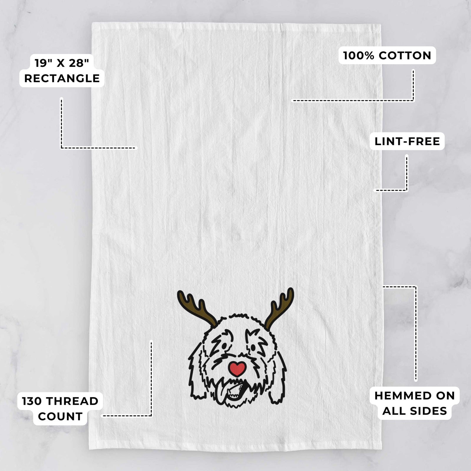 Minimalist line drawing of Barry the Goldendoodle with reindeer antlers and a red nose on a tea towel, with feature callouts: 19 x 28 inch rectangle, 100% cotton, lint-free, 120 thread count, hemmed on all sides