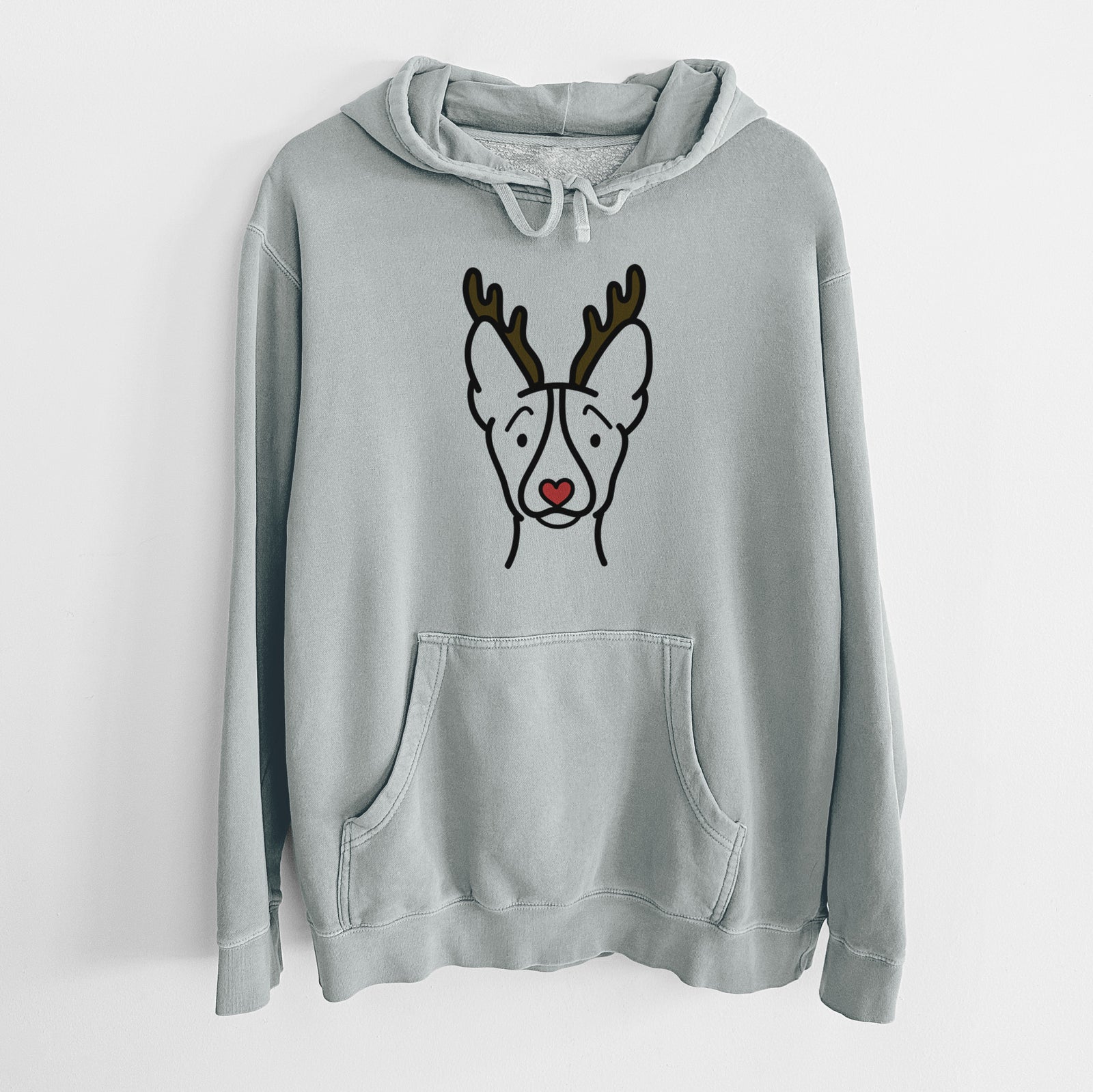 Minimalist line drawing of a Basenji with reindeer antlers and a red nose on a Sage Unisex pigment dyed hoodie