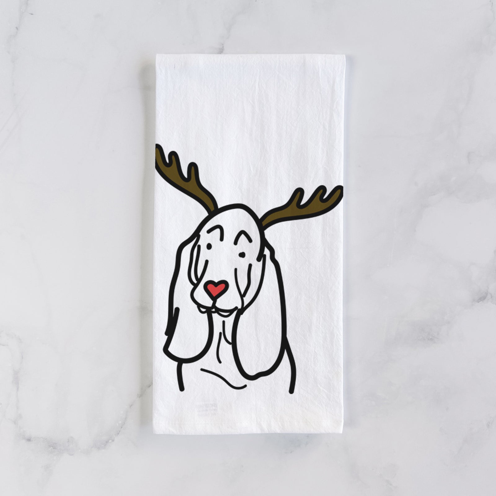 Minimalist line drawing of a Basset Hound with reindeer antlers and a red nose on a tea towel